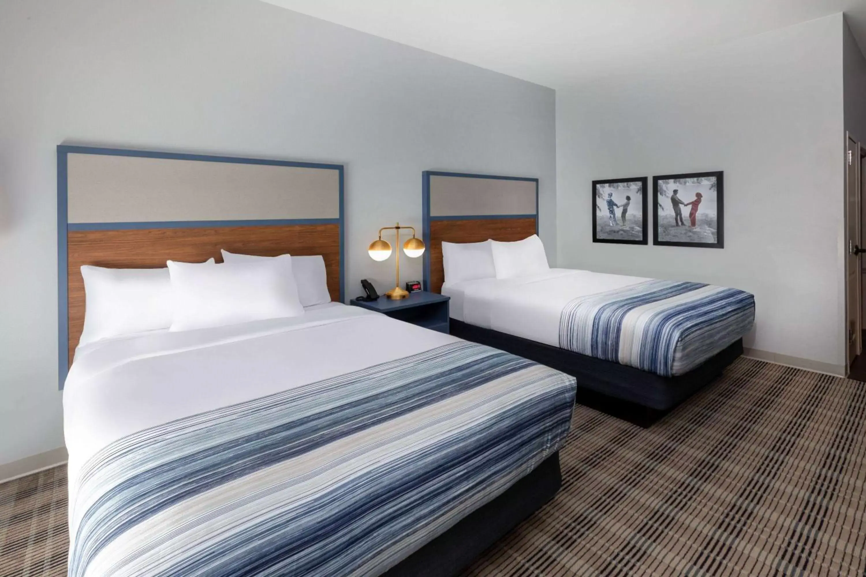 Photo of the whole room, Bed in AmericInn by Wyndham Mountain Home