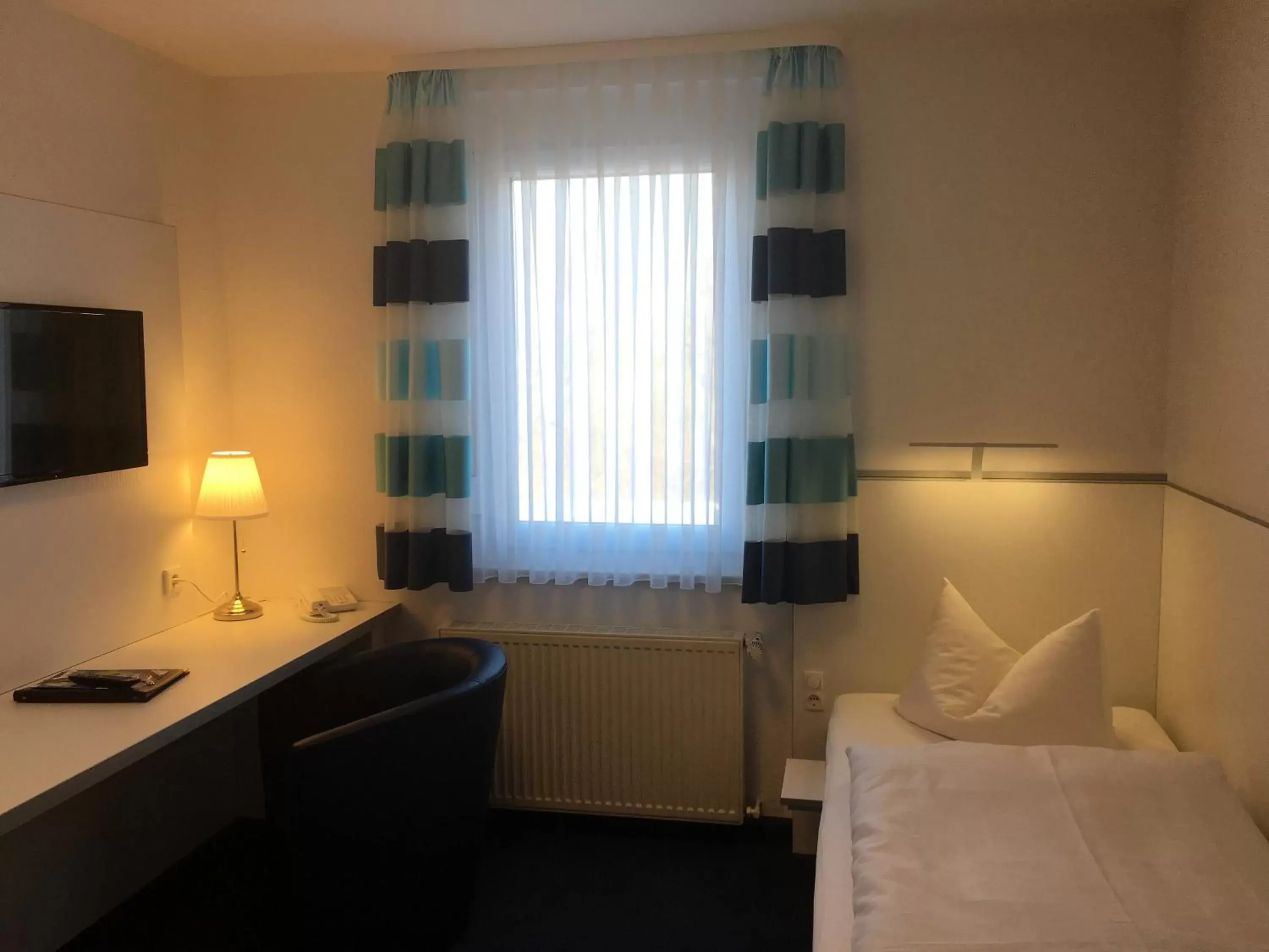 Single Room in Hotel & Restaurant Park Cafe ISA Single Room in Hotel & Restaurant Park Cafe ISA