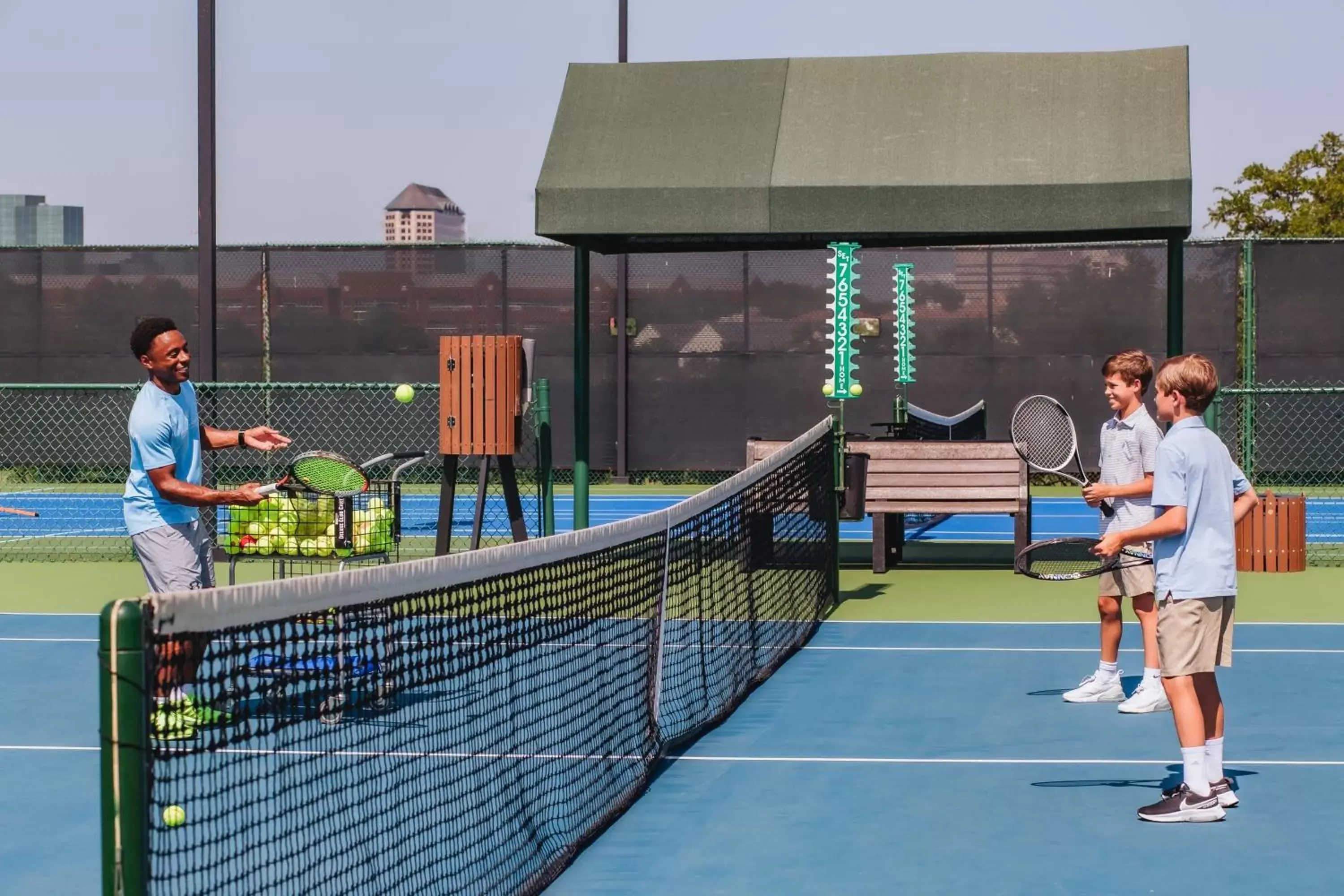 Tennis court, Children in The Las Colinas Resort, Dallas