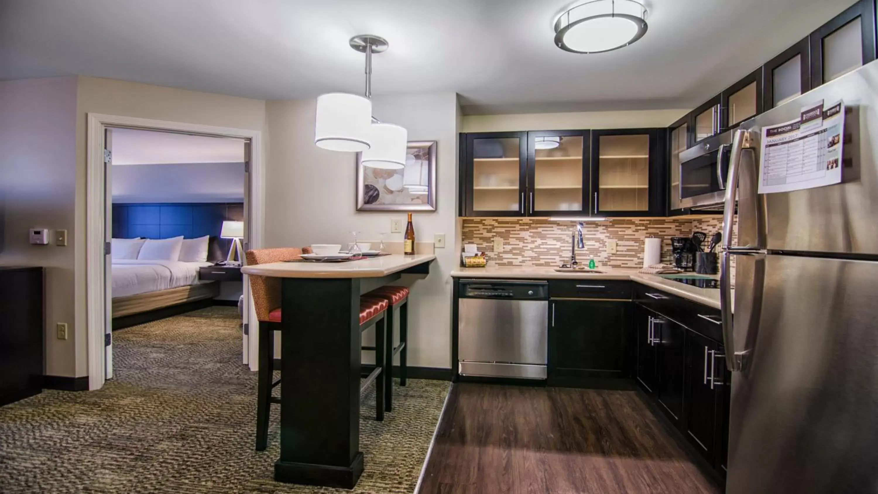 Photo of the whole room, Kitchen/Kitchenette in Staybridge Suites Marquette, an IHG Hotel
