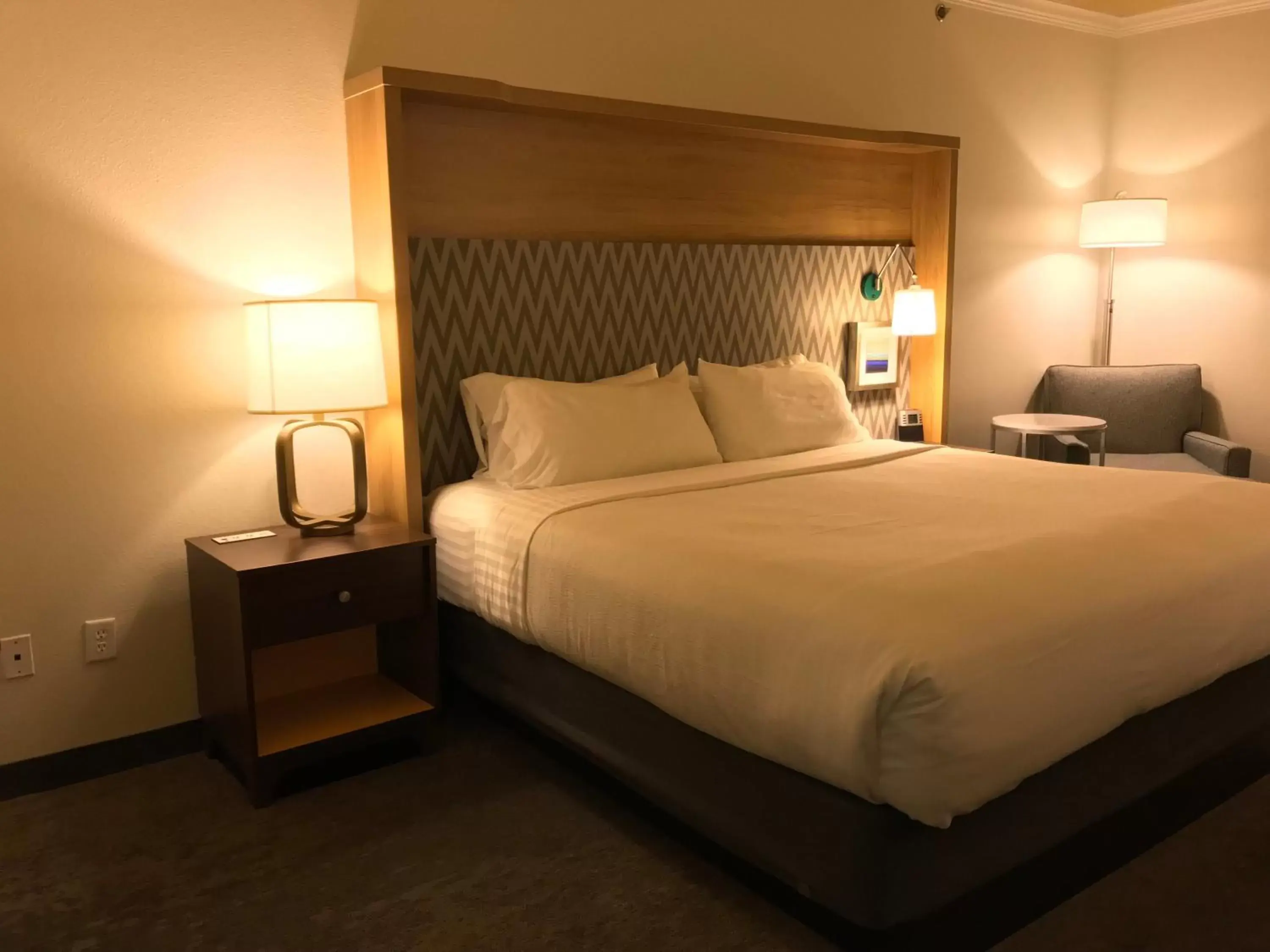 Photo of the whole room, Bed in Holiday Inn & Suites McKinney - N Allen, an IHG Hotel