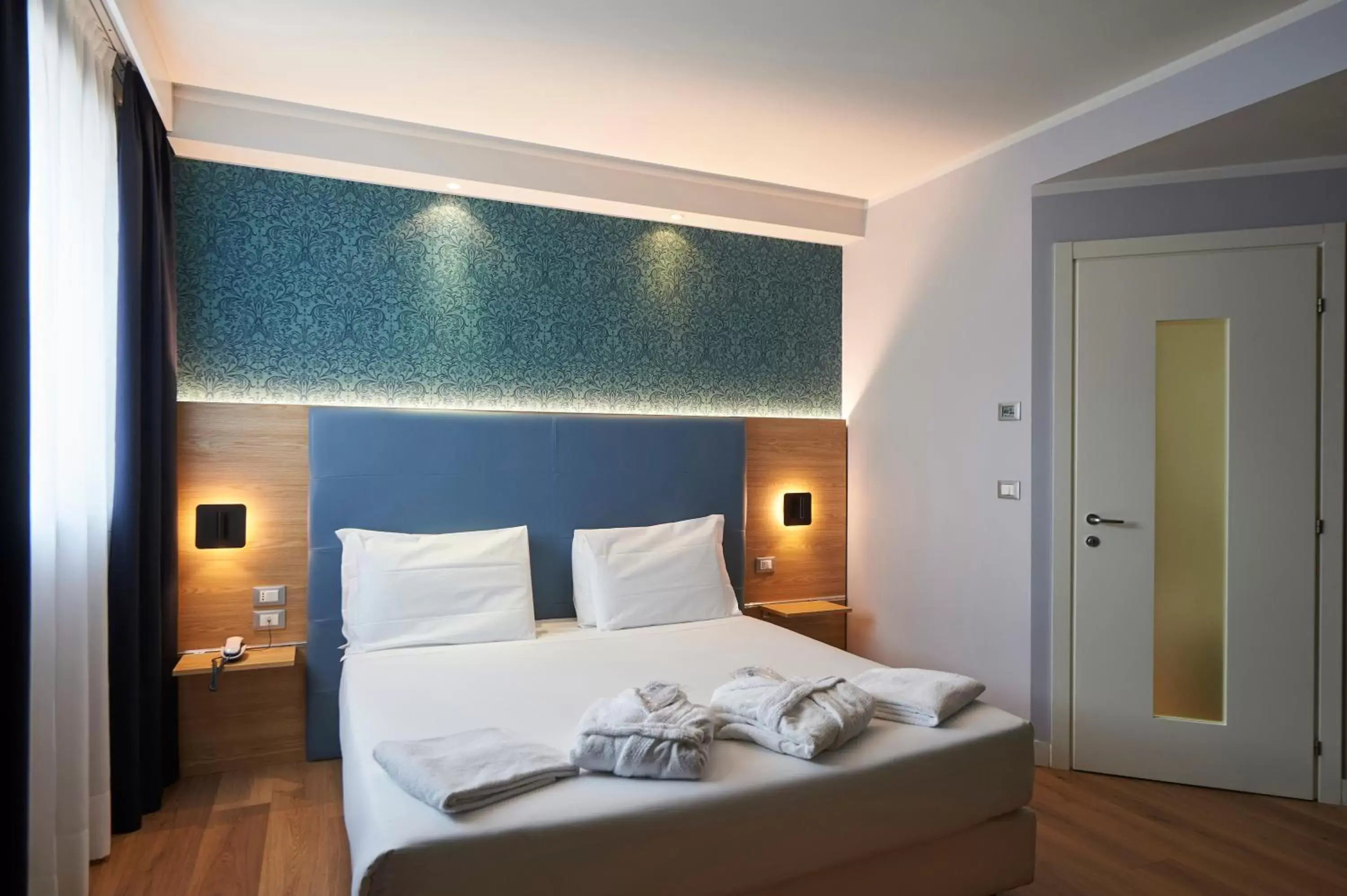 Bed in Neo Hotel Bed in Neo Hotel