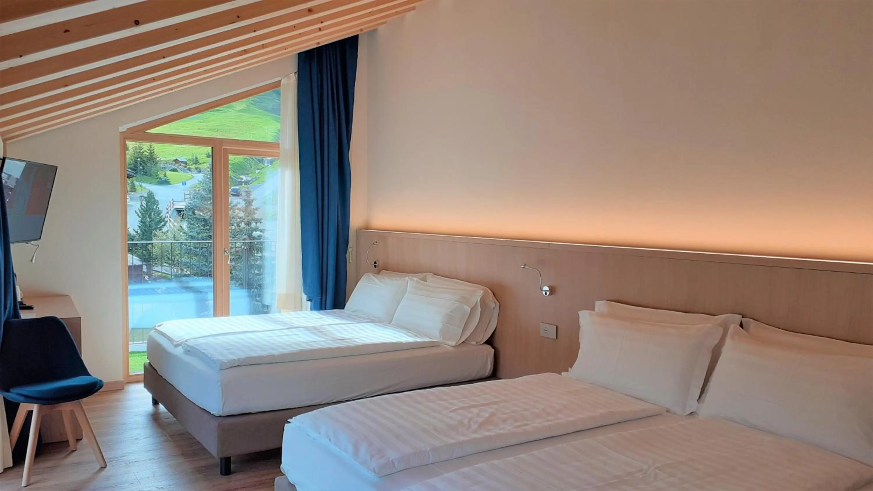 Bed in Livì Family Hotel