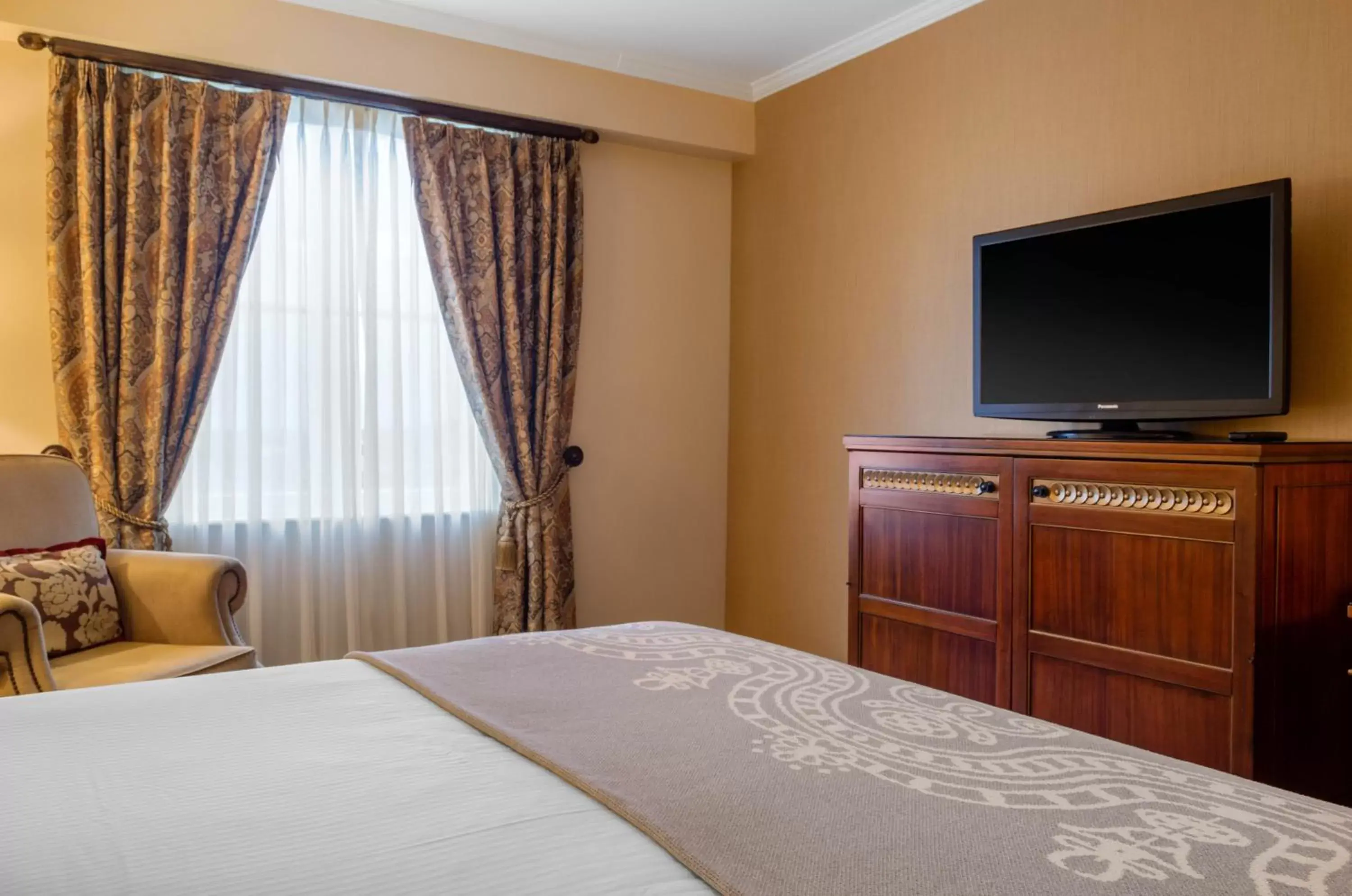 Photo of the whole room, TV/Entertainment Center in Omni Royal Orleans Hotel