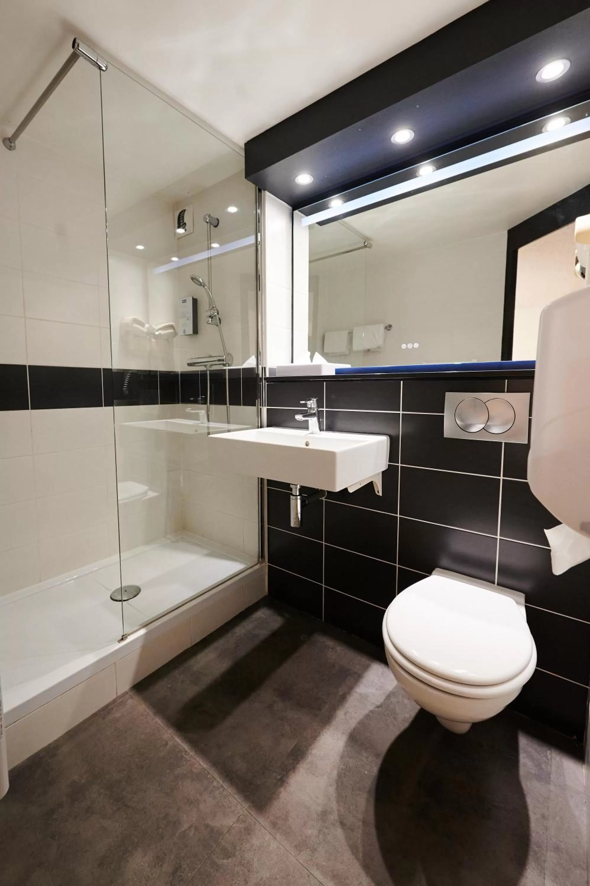 Bathroom in Kyriad Hotel Laval