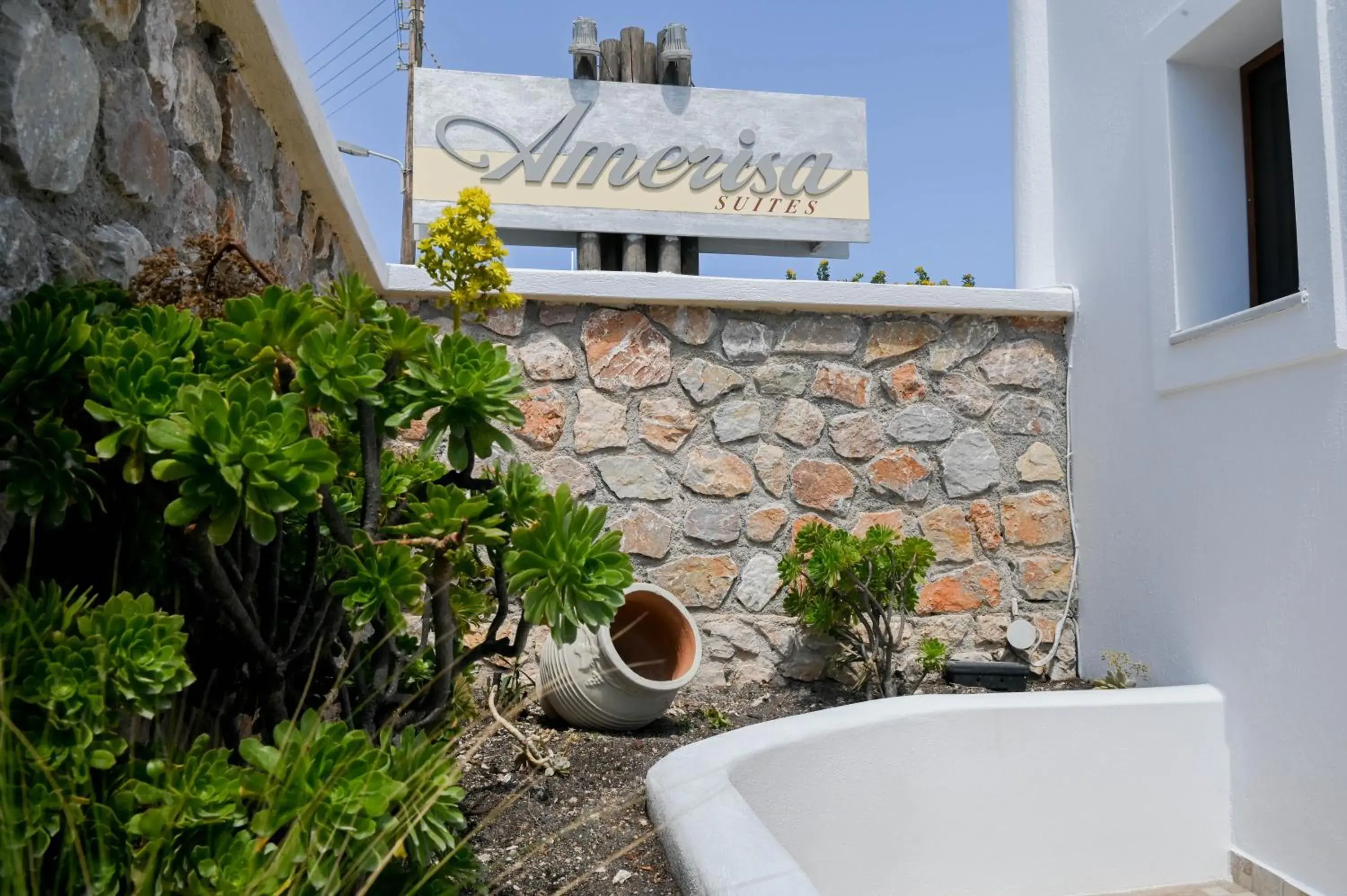 Property building, Bathroom in Amerisa Suites