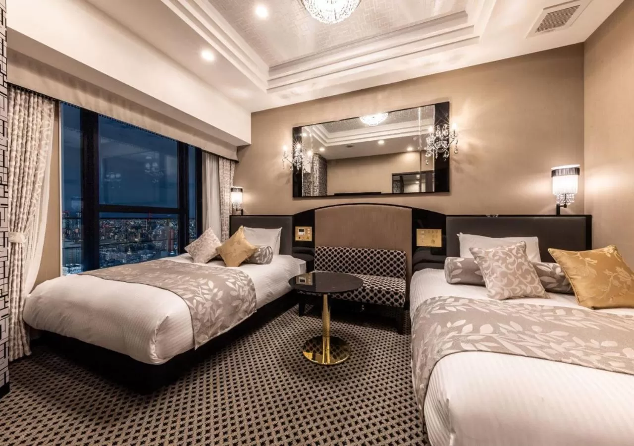 Living room, Bed in APA Hotel & Resort Osaka Umeda Eki Tower