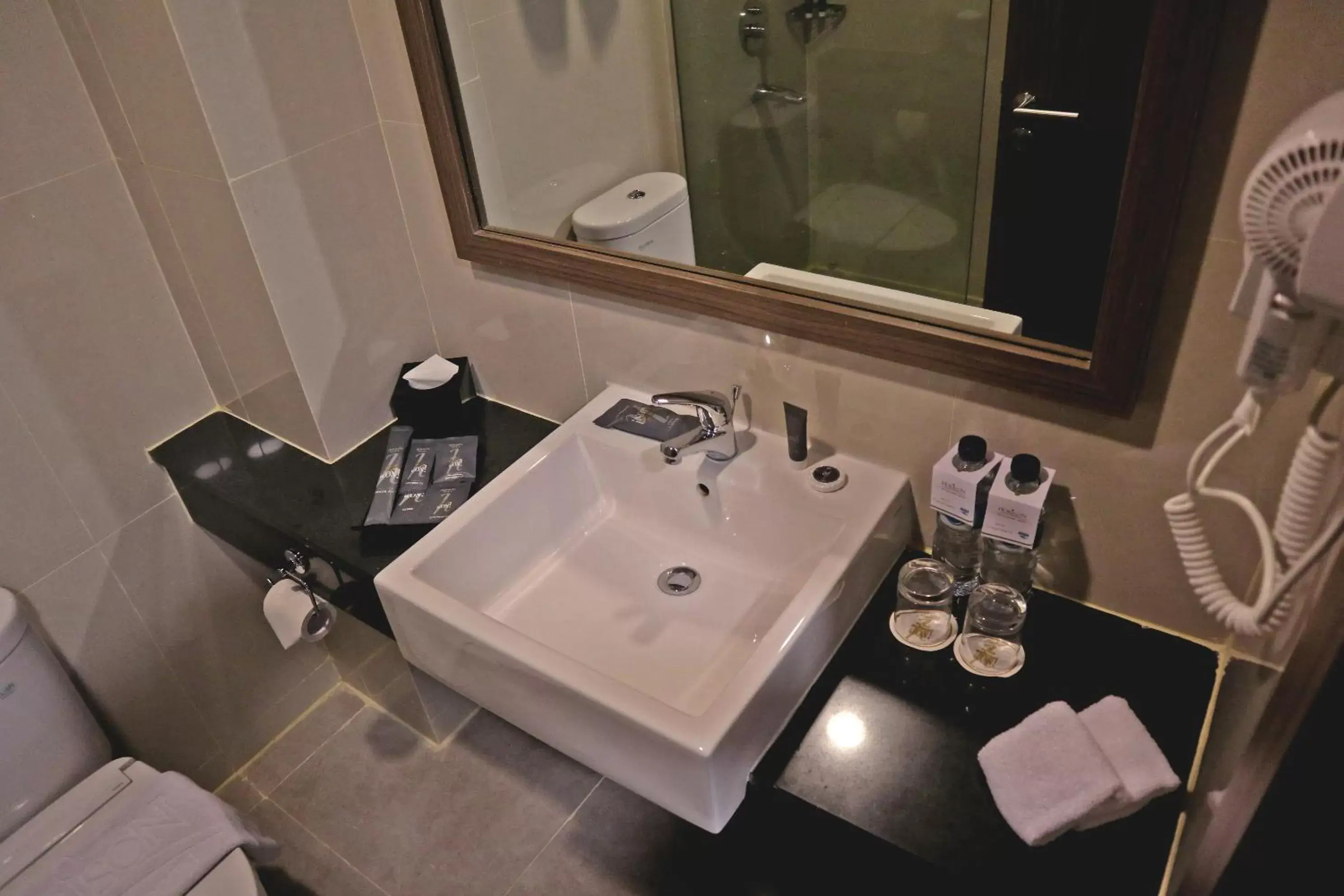Bathroom in Anara Sky Kualanamu Hotel