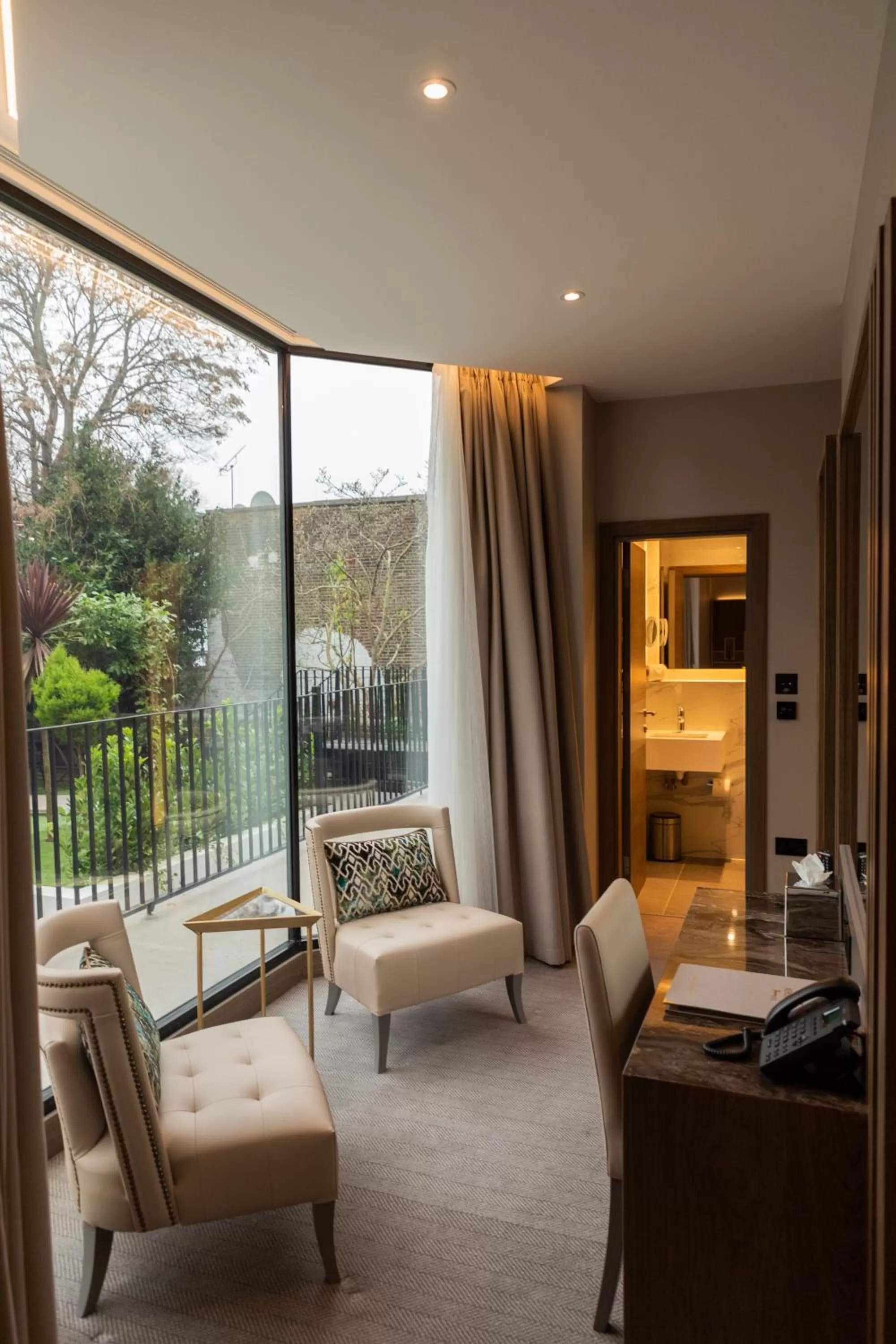 Seating area in Merit Kensington Hotel