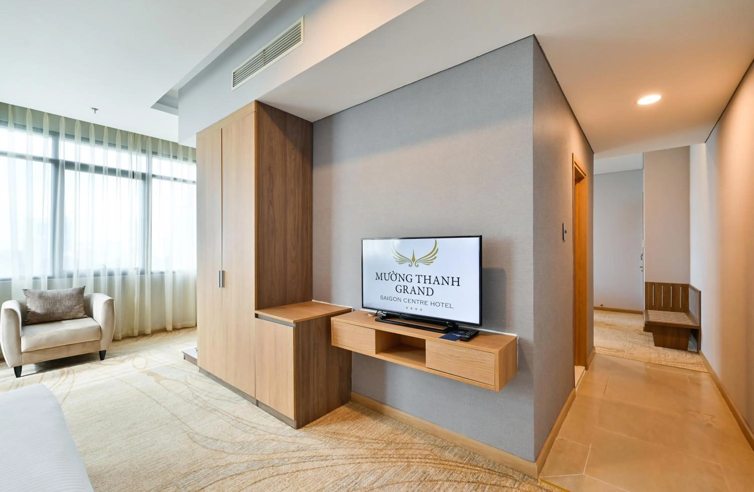 Communal lounge/ TV room in Muong Thanh Grand Saigon Centre Hotel