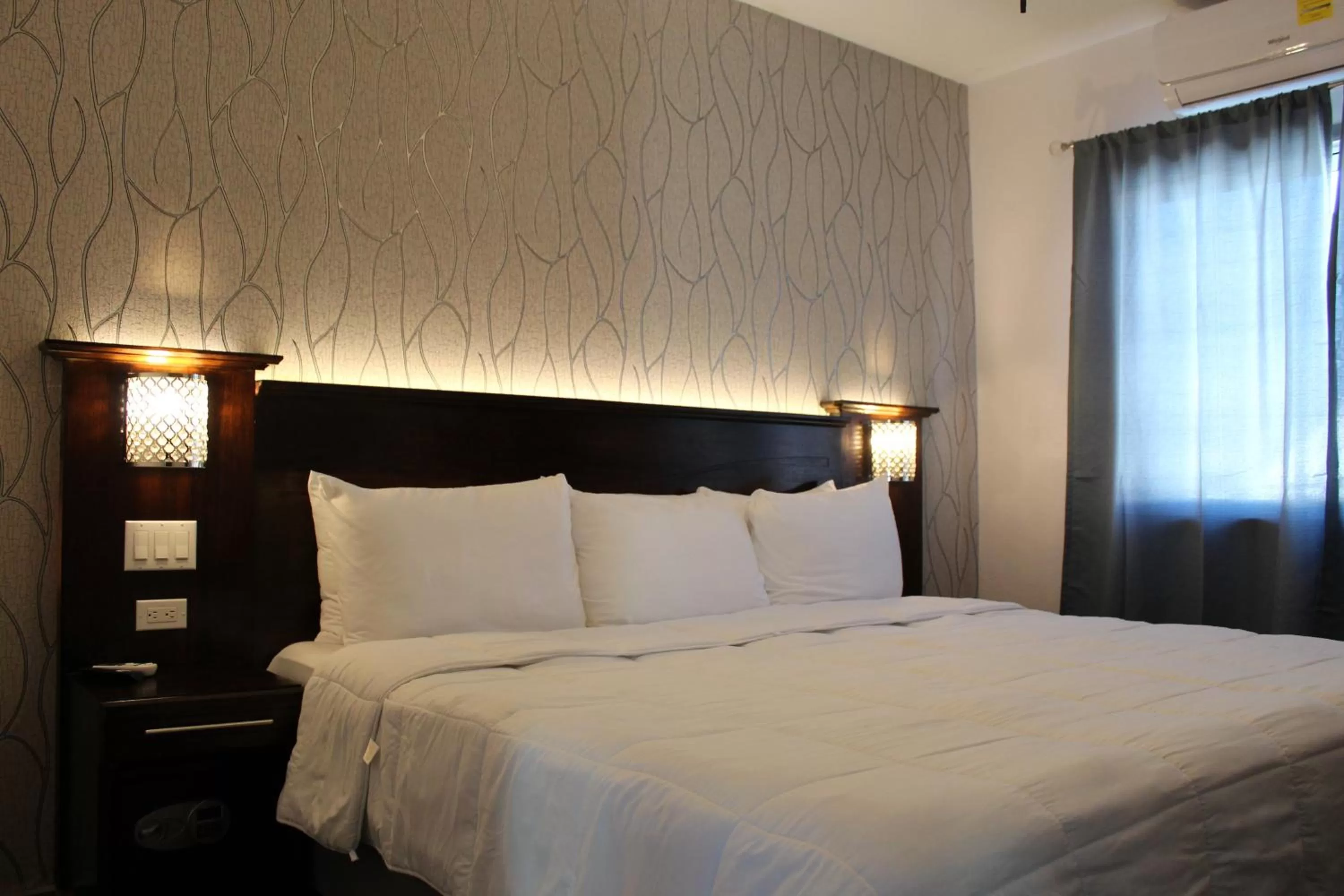 Bed in Barefoot Caye Caulker Hotel