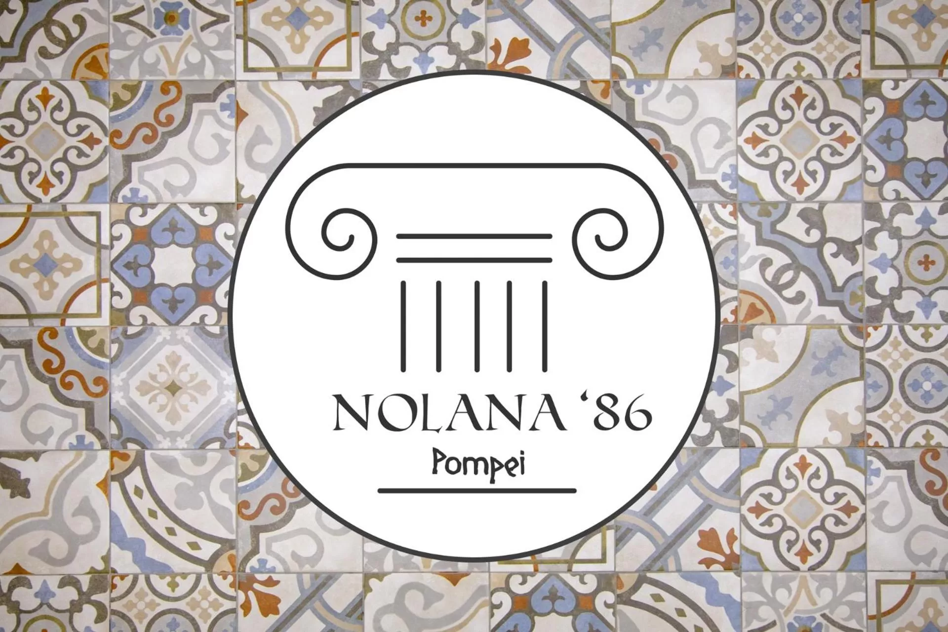 Property logo or sign in Nolana '86