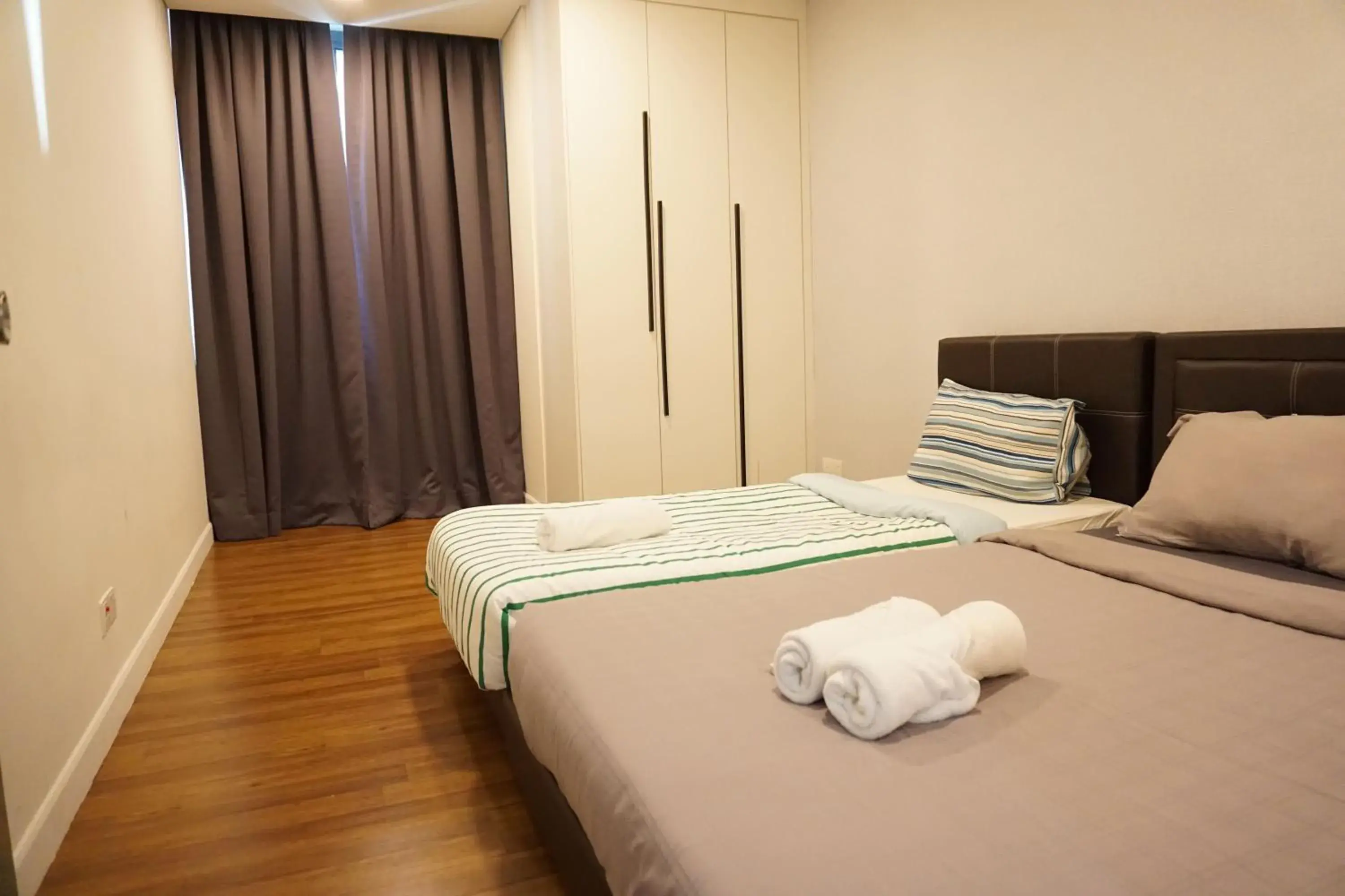 Bedroom, Bed in Mercu Summer Suite KLCC @ Penguin Homes