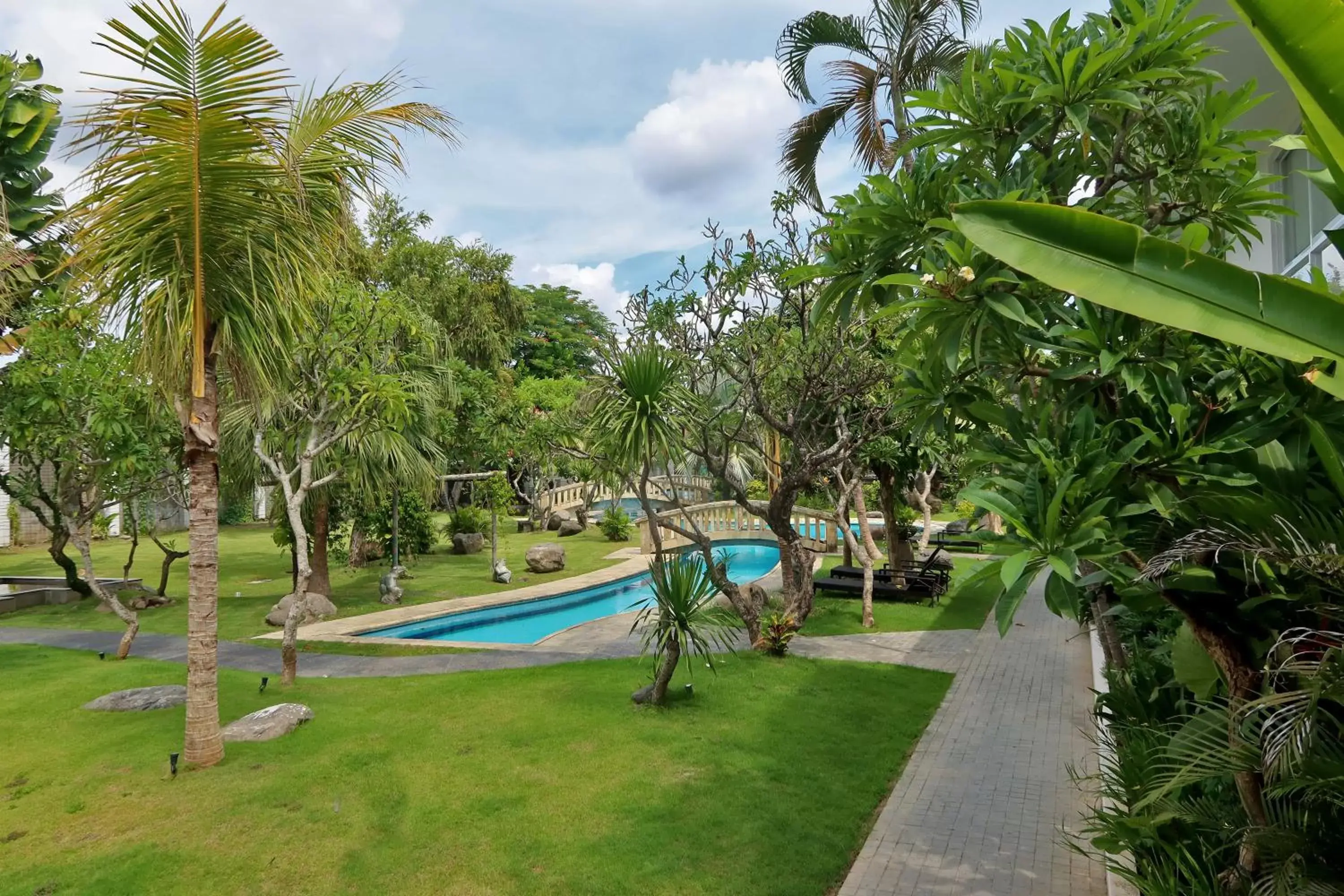 Garden, Swimming Pool in The Cakra Hotel