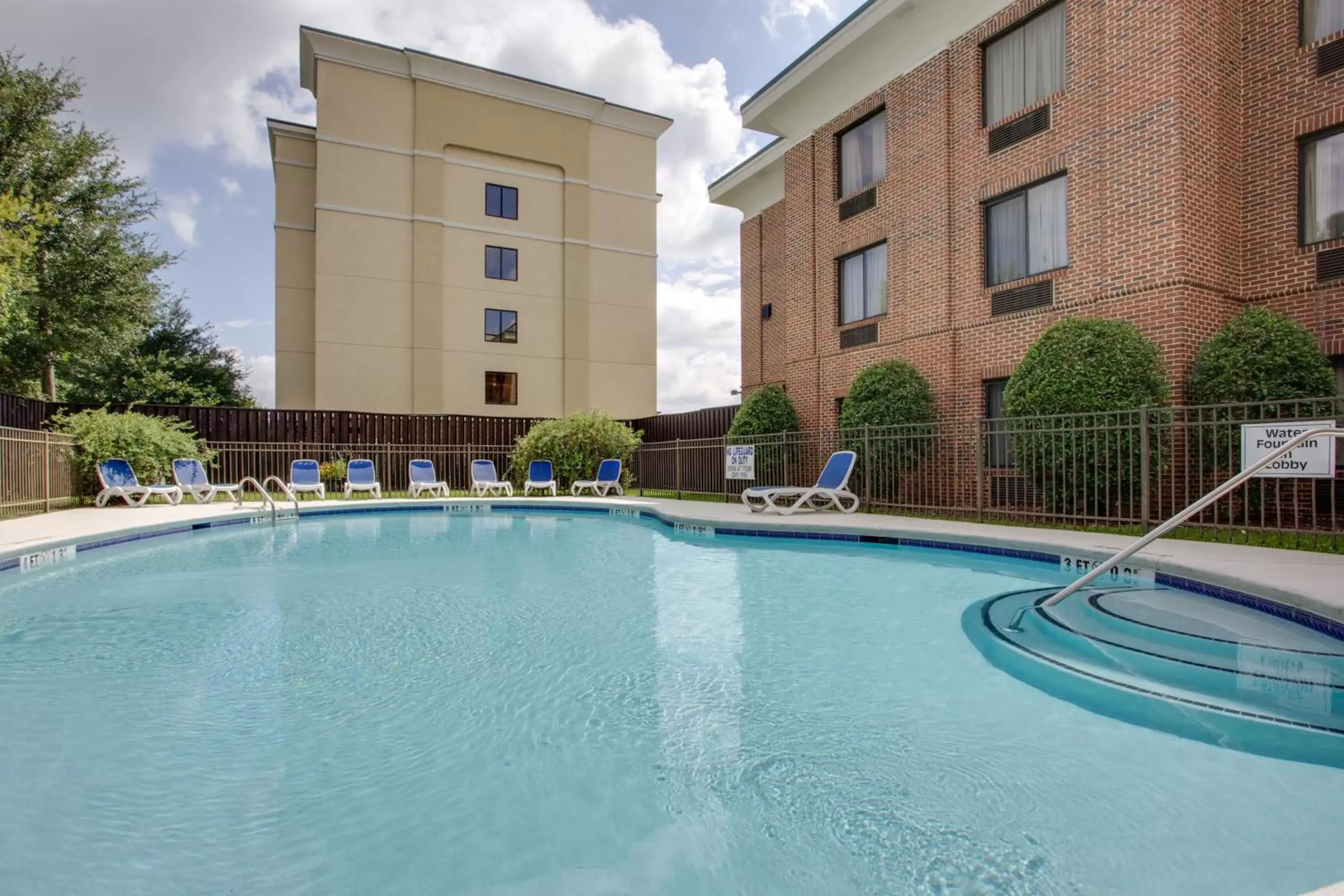 Swimming Pool in Holiday Inn Express Hotel & Suites Columbia-I-20 at Clemson Road, an IHG Hotel