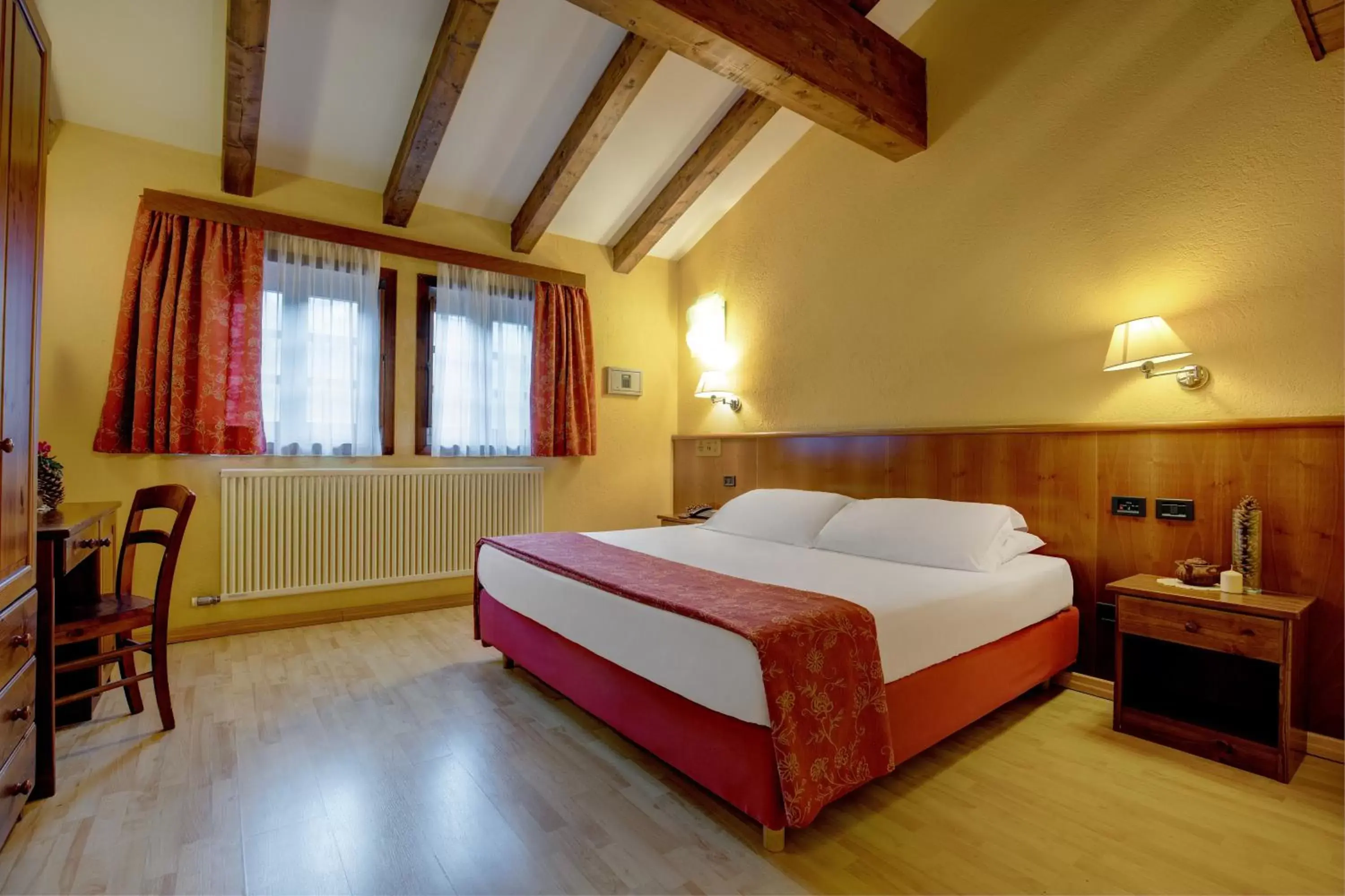 Photo of the whole room, Bed in iH Hotels Courmayeur Mont Blanc