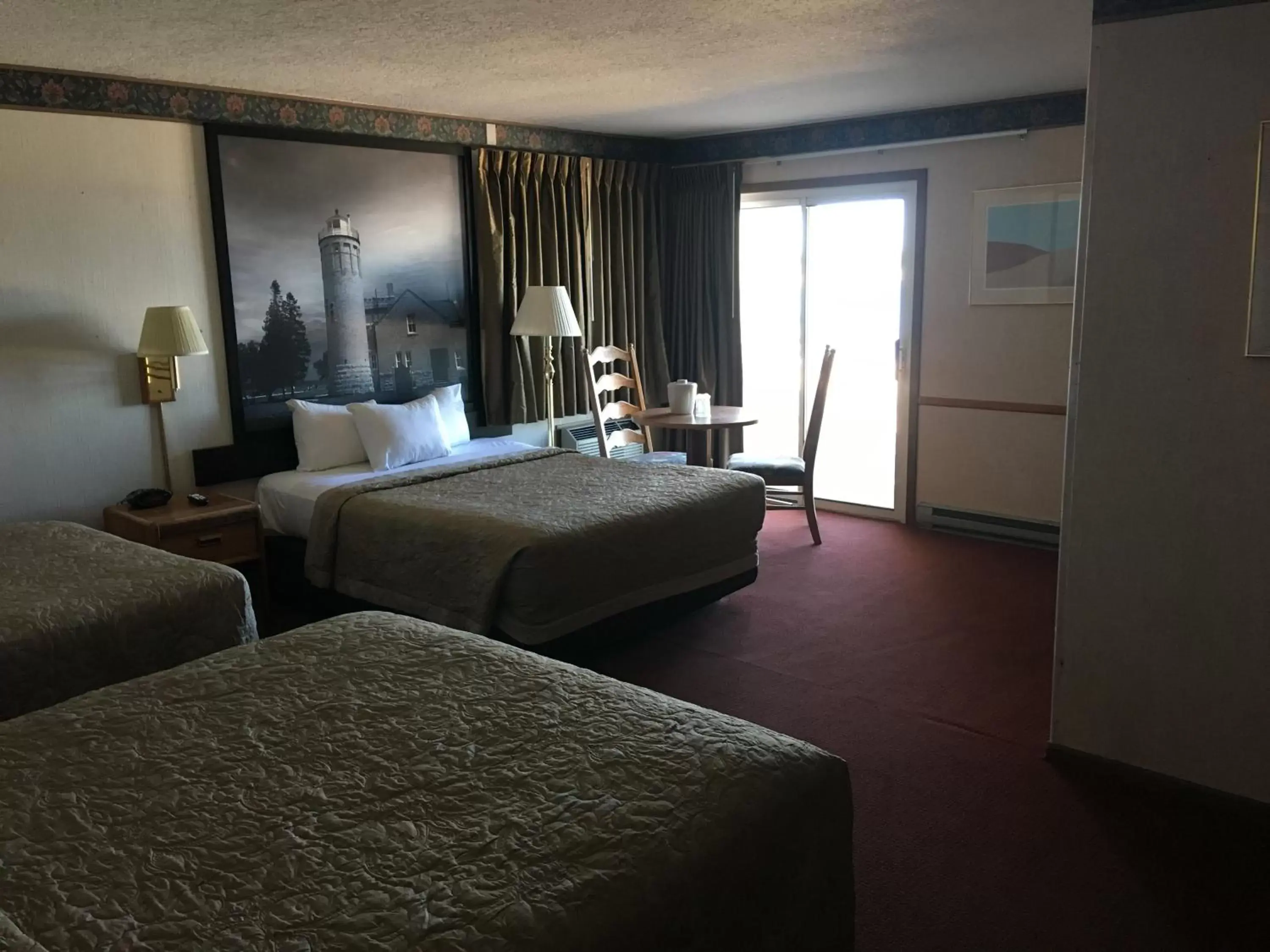 Photo of the whole room in Super 8 Beachfront by Wyndham Mackinaw City, MI