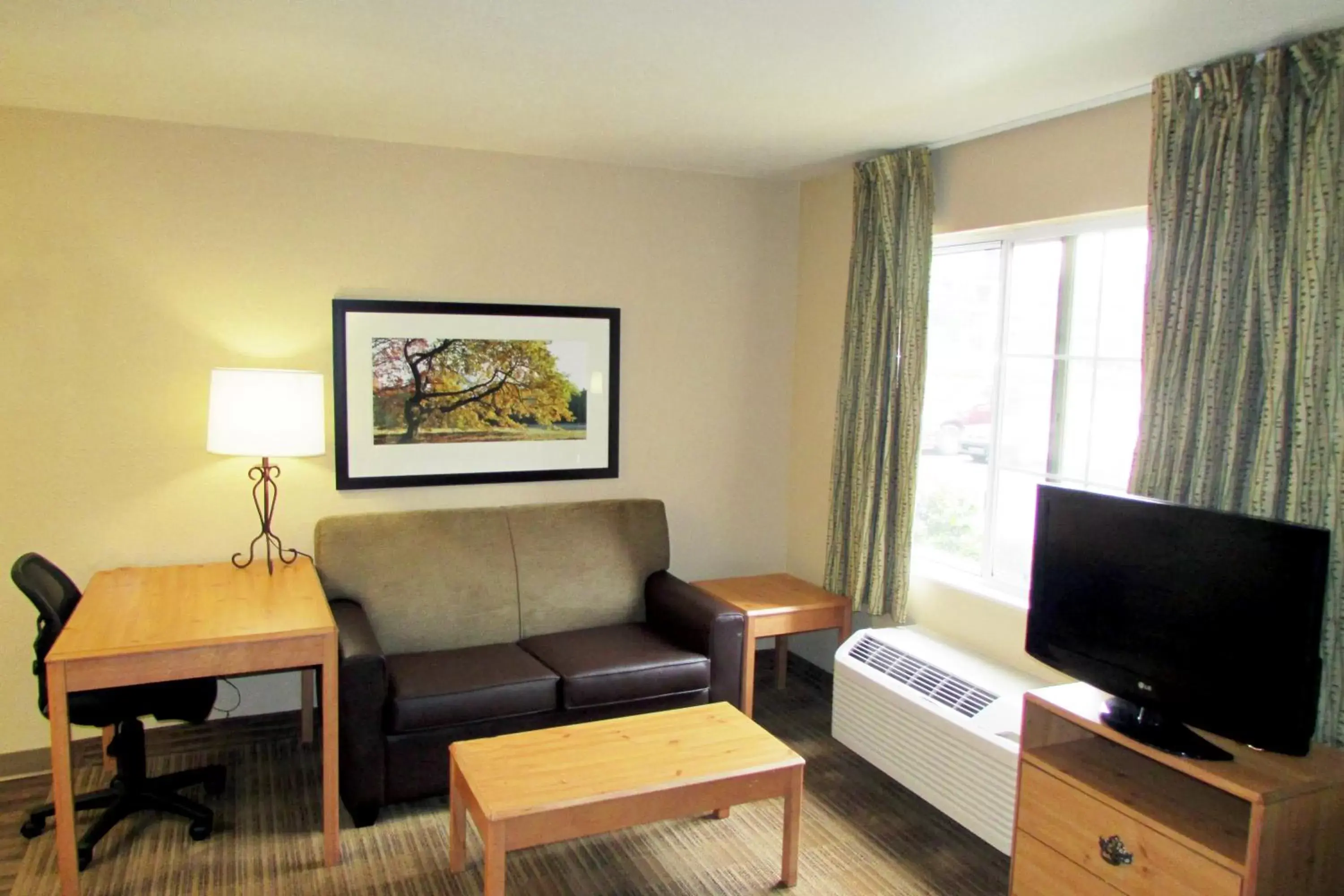 TV and multimedia, Seating Area in Extended Stay America Select Suites - Atlanta - Marietta - Wildwood