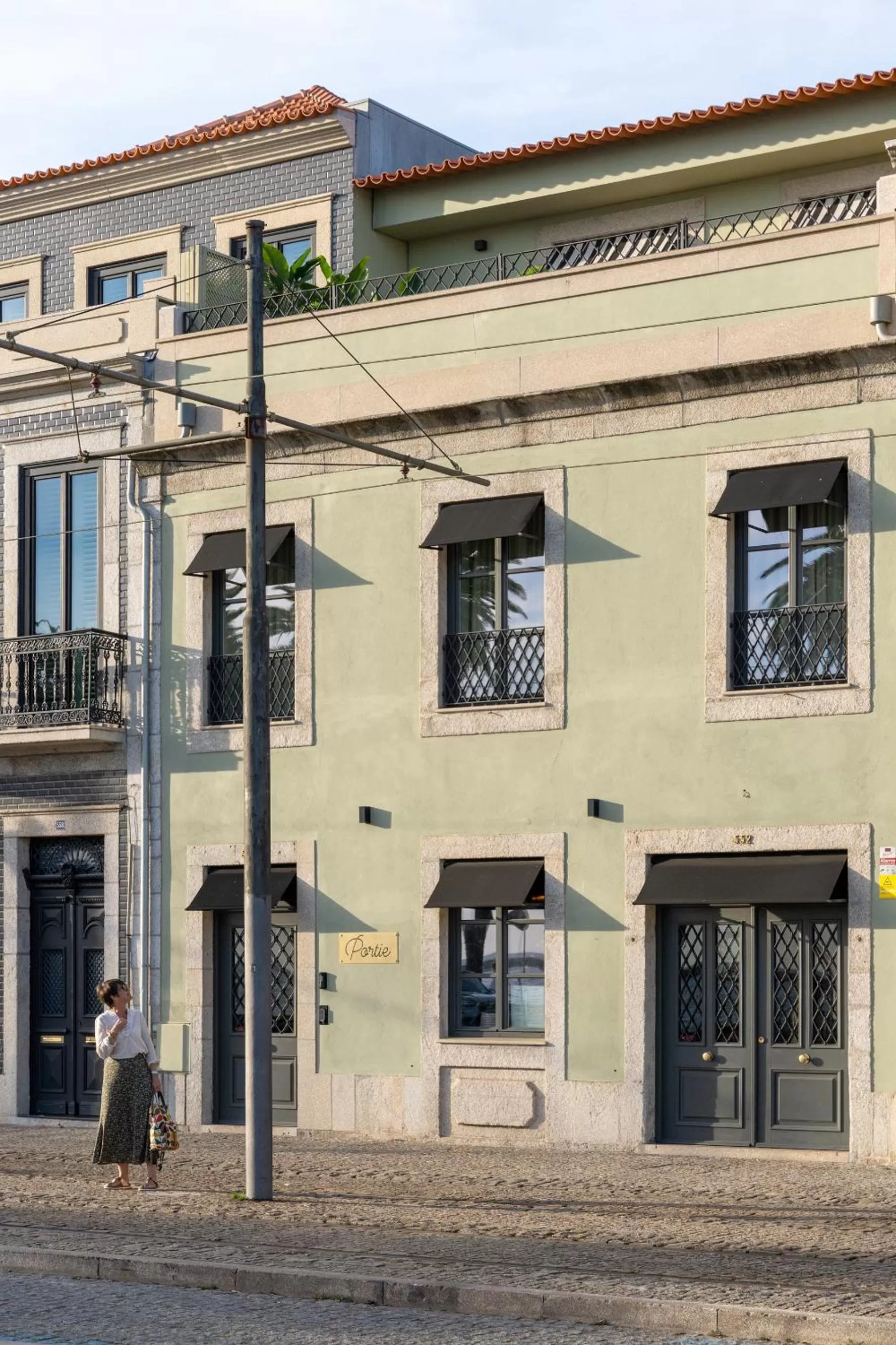 Property Building in Portie Deluxe Suites by DA'HOME