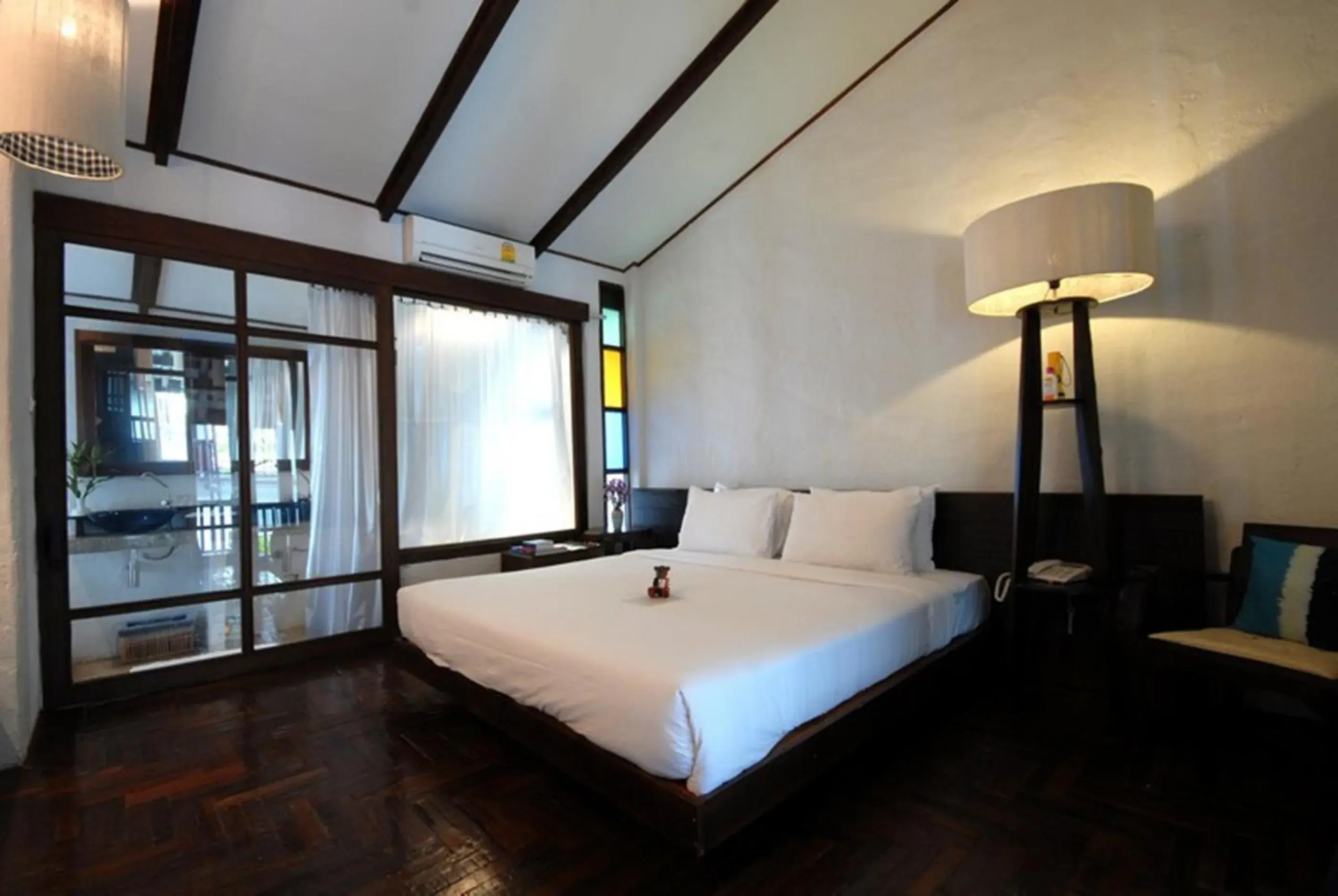 Bed in Banthai Village Hotel