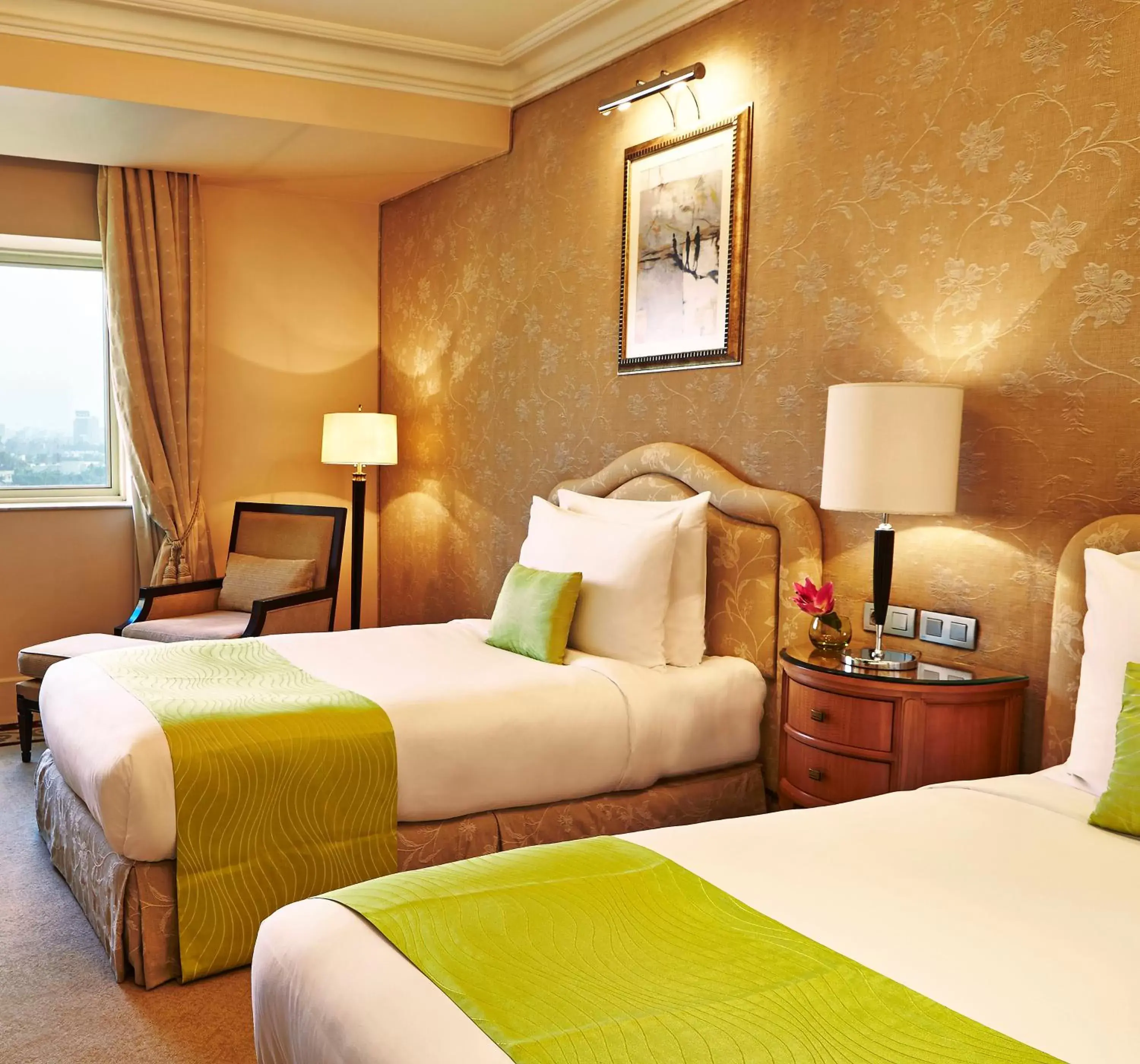 Bed in Kempinski Nile Hotel, Cairo