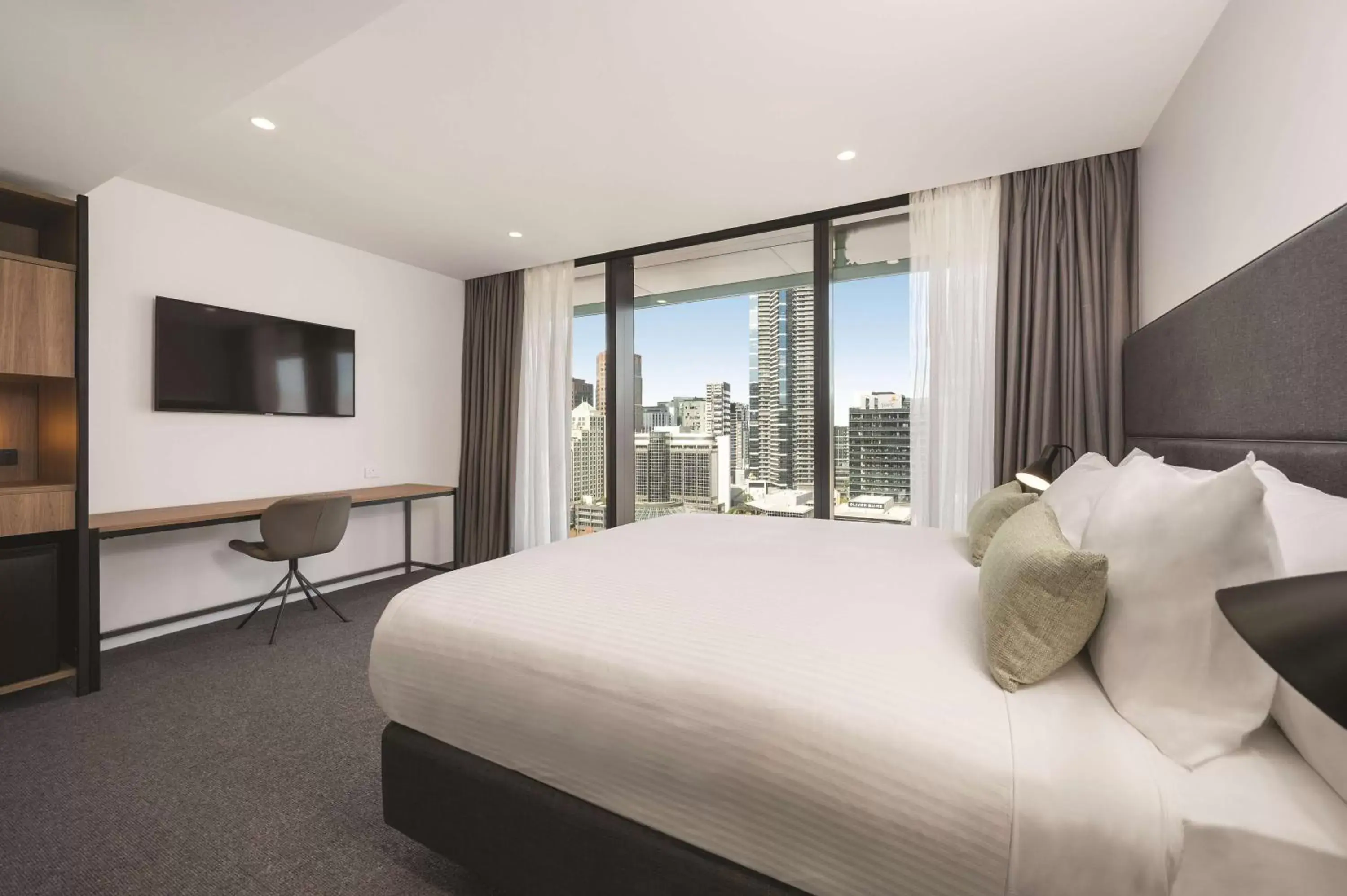 Bedroom in Vibe Hotel Melbourne