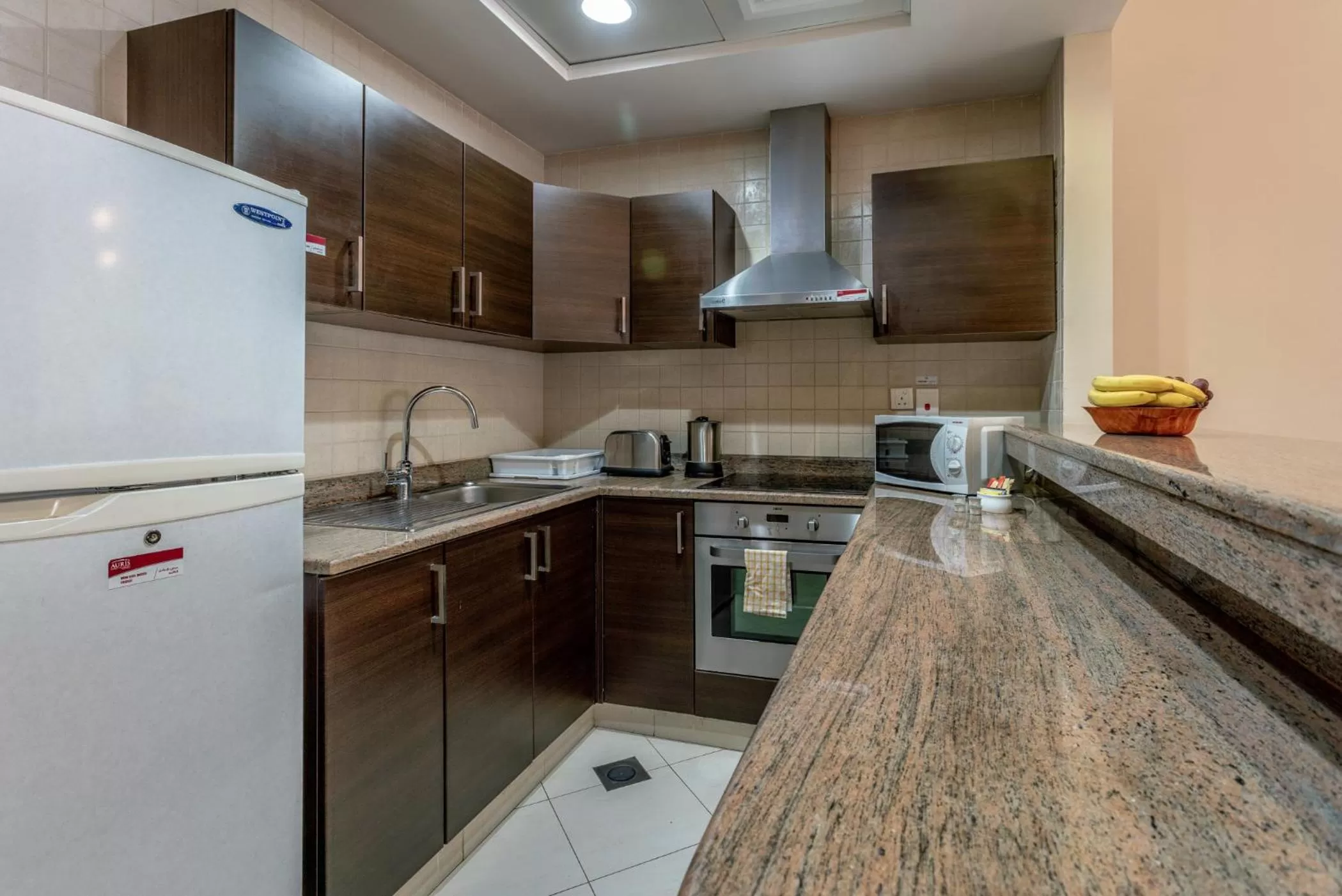 Kitchen or kitchenette in Auris Boutique Hotel Apartments, Al Barsha - At The Mall