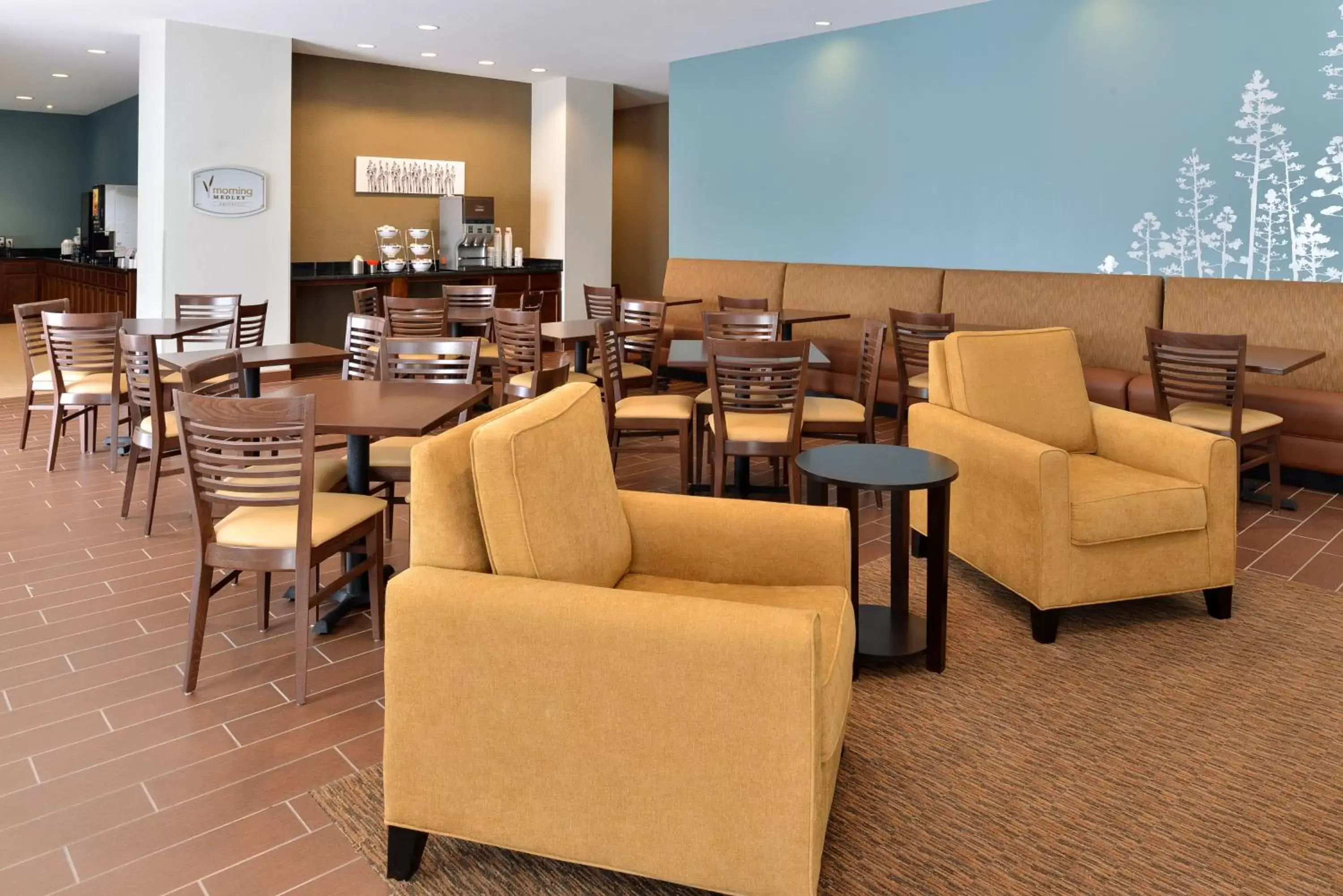 Communal lounge/ TV room, Restaurant/Places to Eat in Sleep Inn & Suites