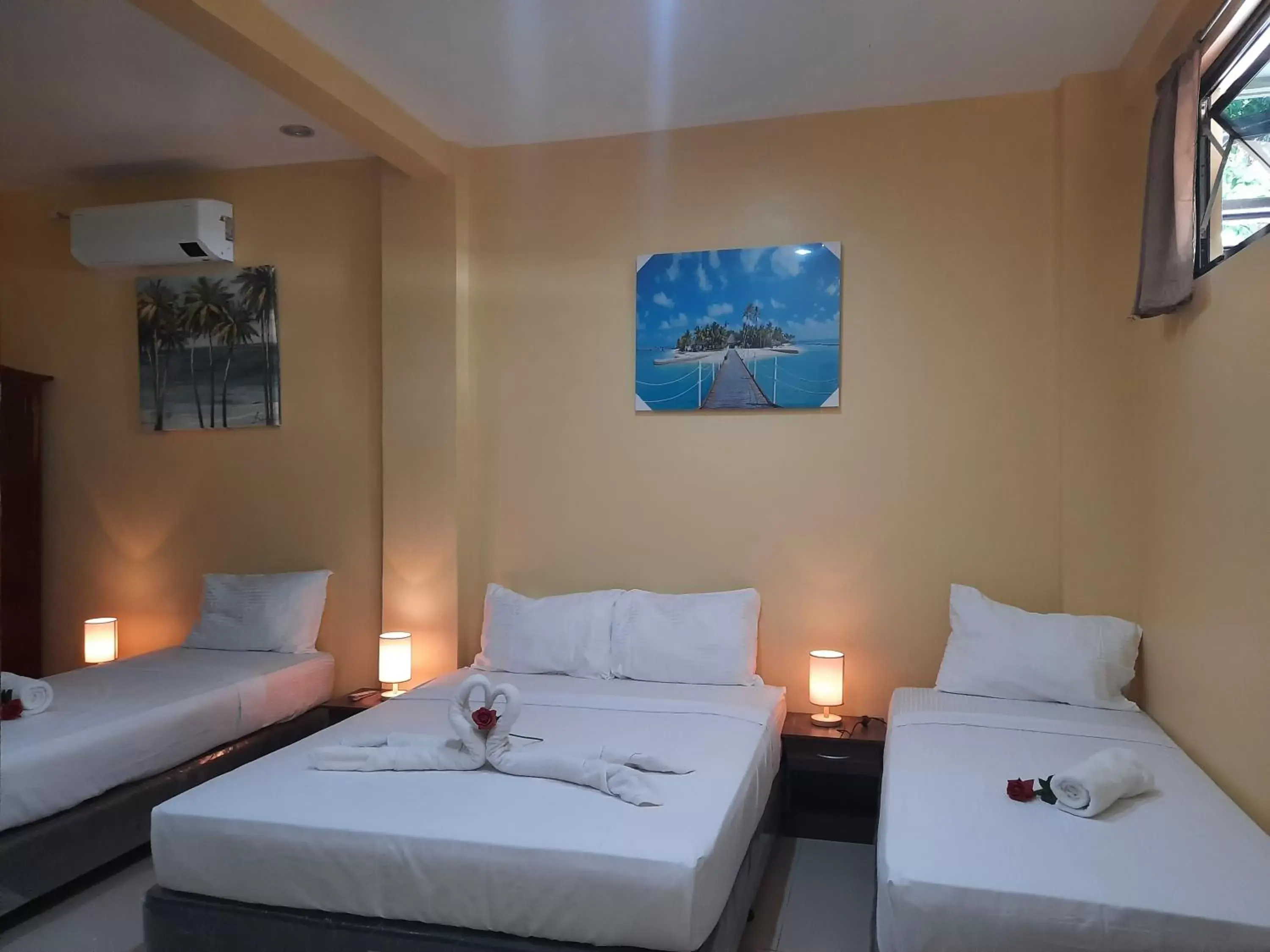 Bed in Mabini Hotel Bed in Mabini Hotel