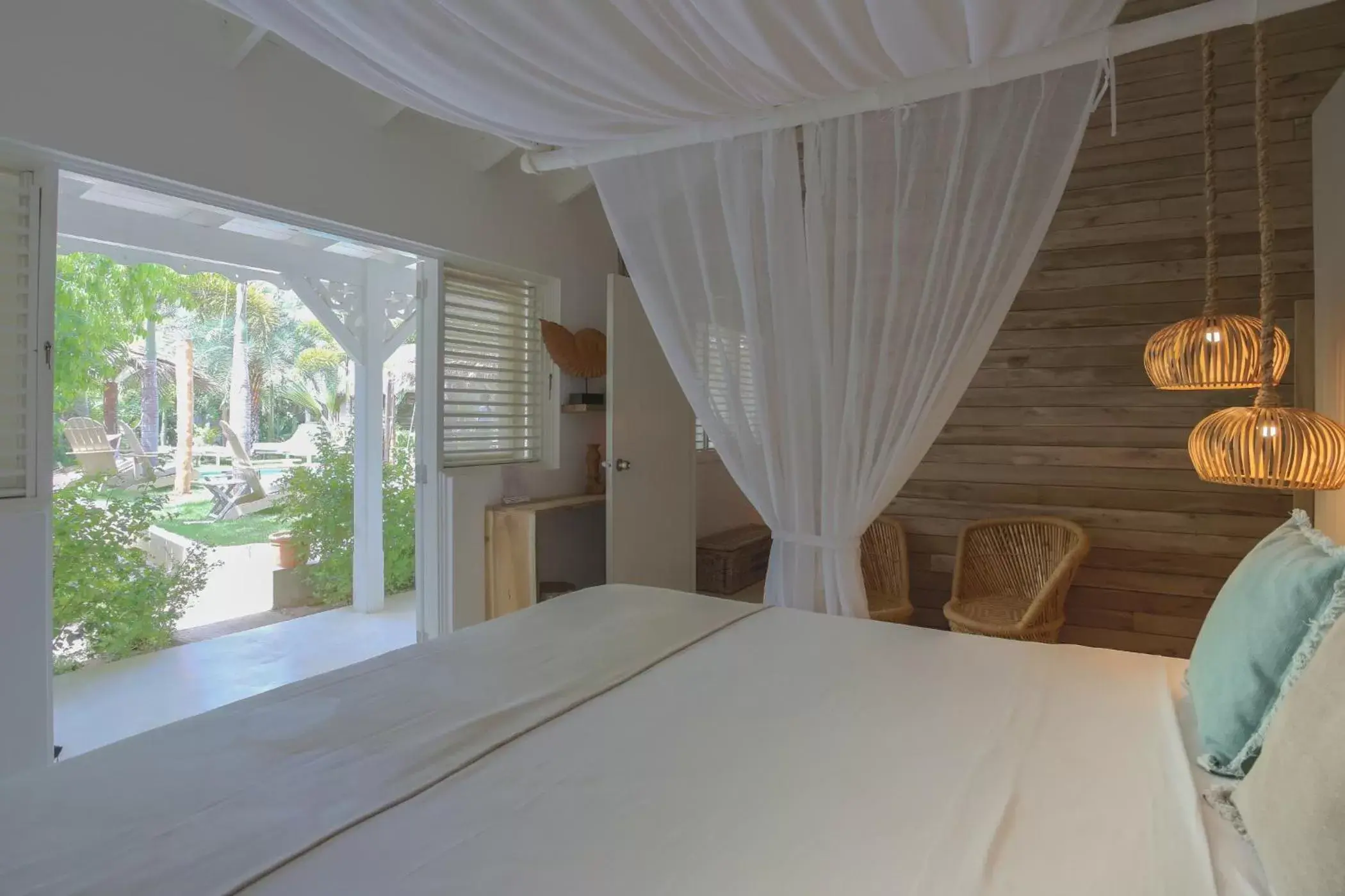 Bed in Mahona Boutique Hotel