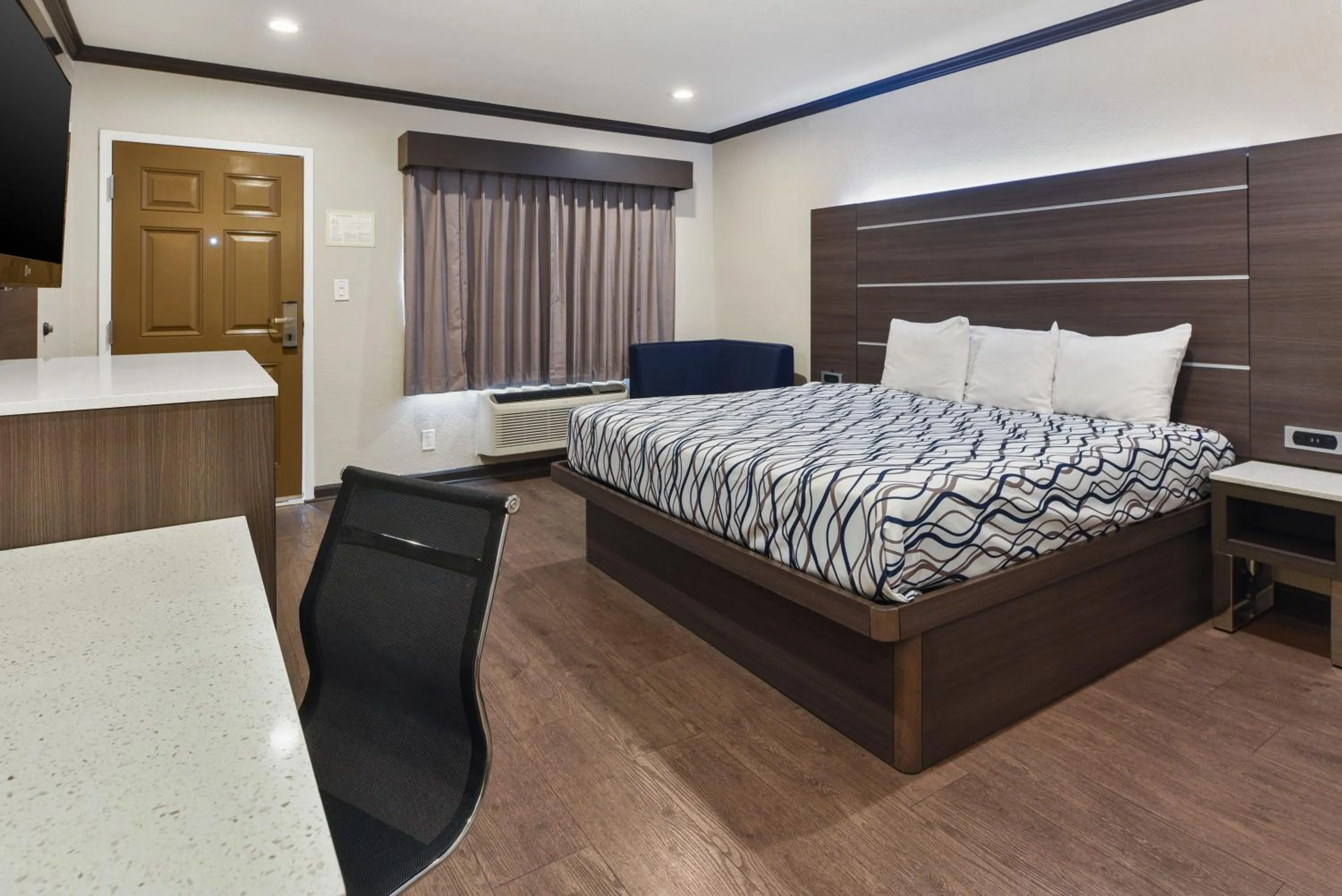 Bed in Oak Park Motel