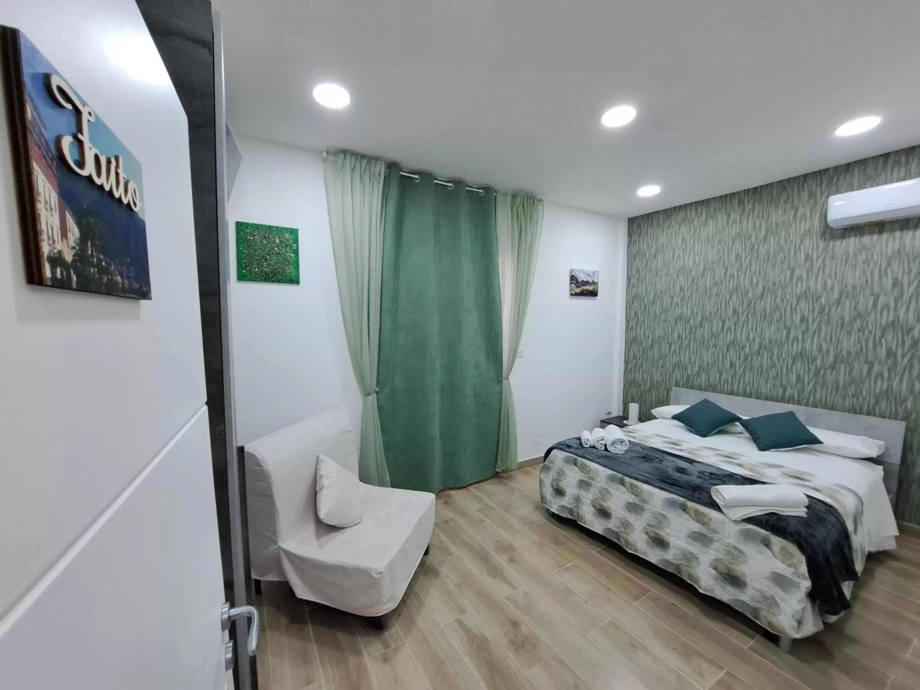 Deluxe Room (2 Adults + 1 Child) in Domus de loco sano Deluxe Room (2 Adults + 1 Child) in Domus de loco sano