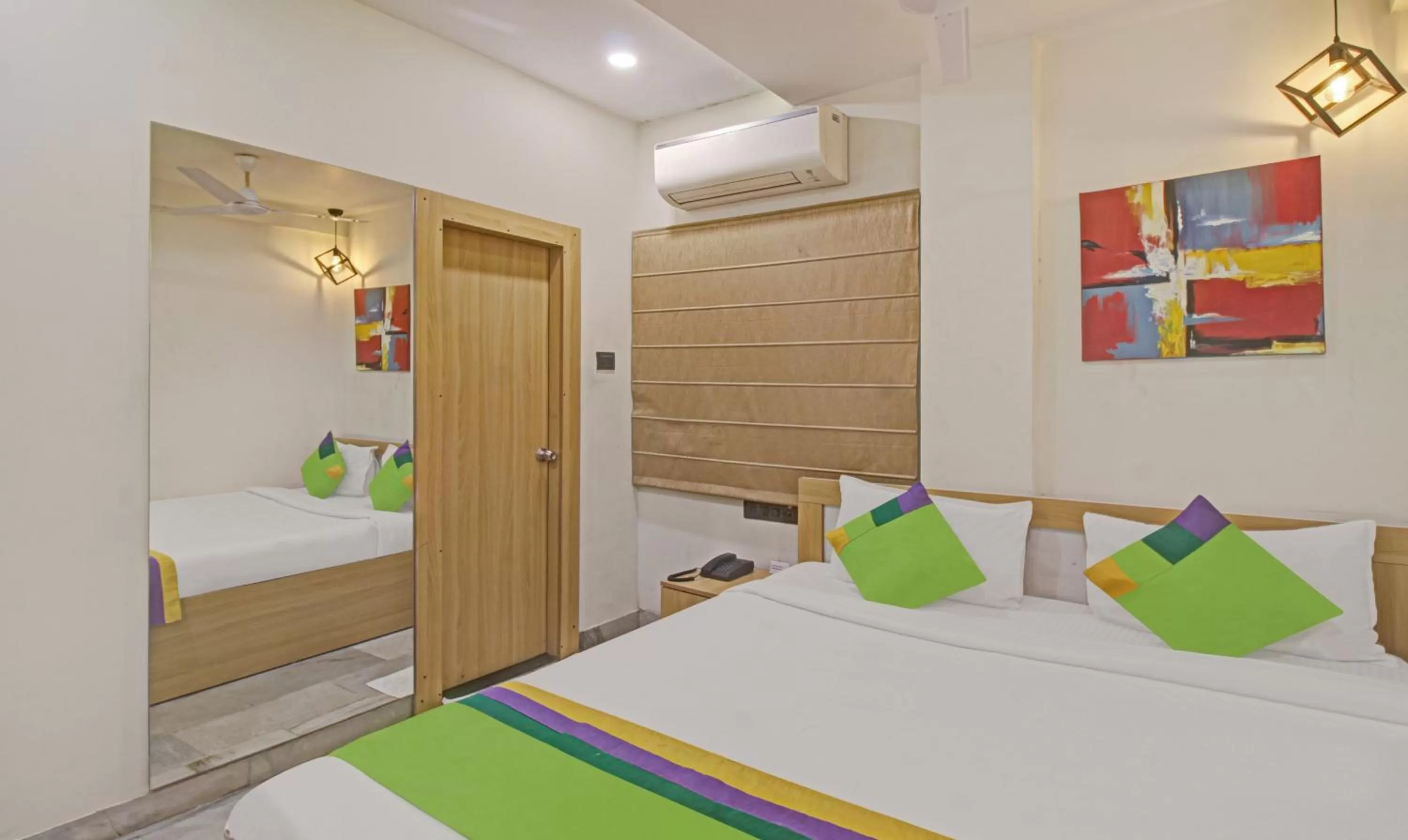 Bedroom, Bed in Treebo The Boss