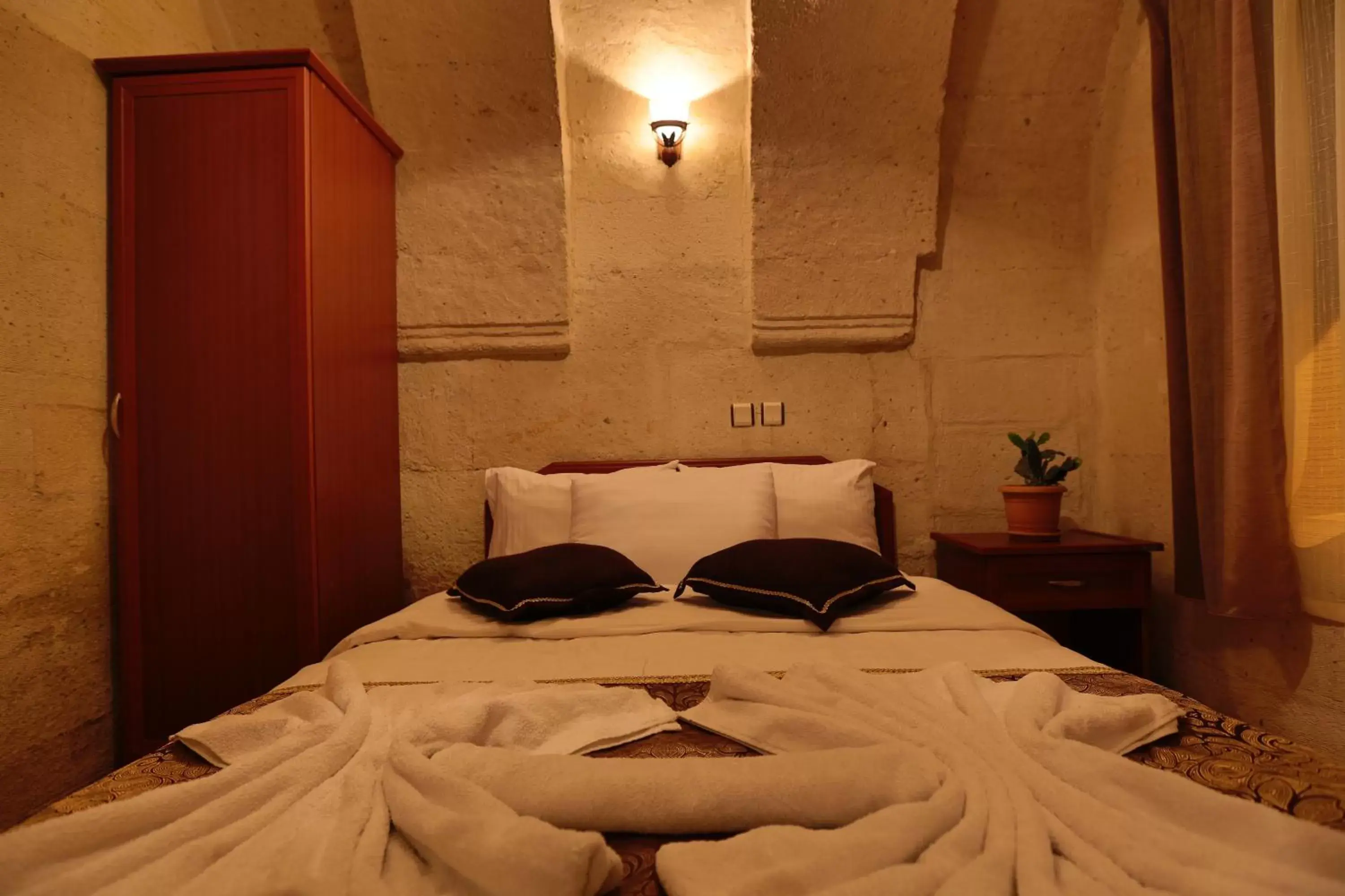 Bed in Guven Cave Hotel