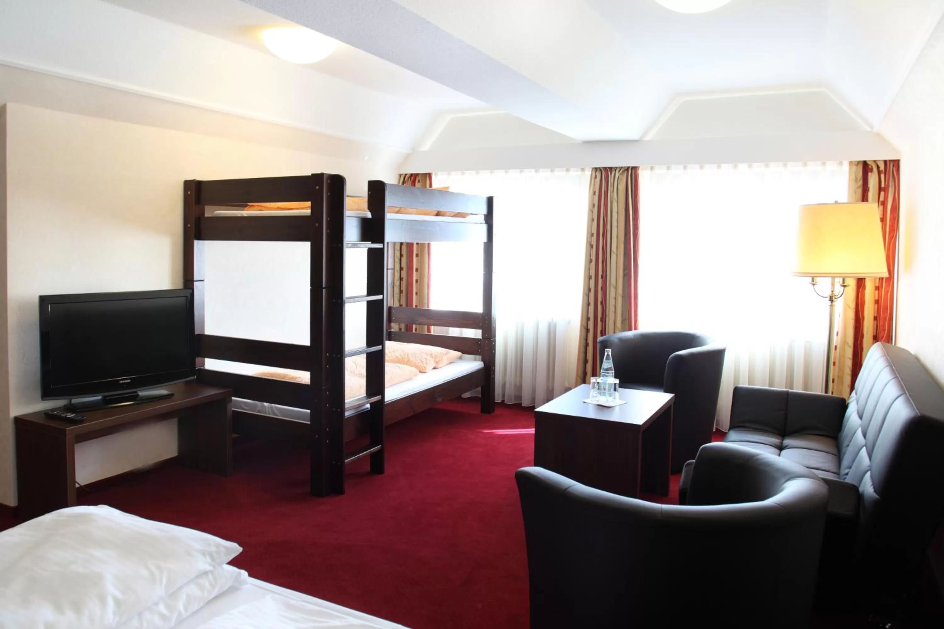 Photo of the whole room, Bed in Lobinger Hotel Weisses Ross