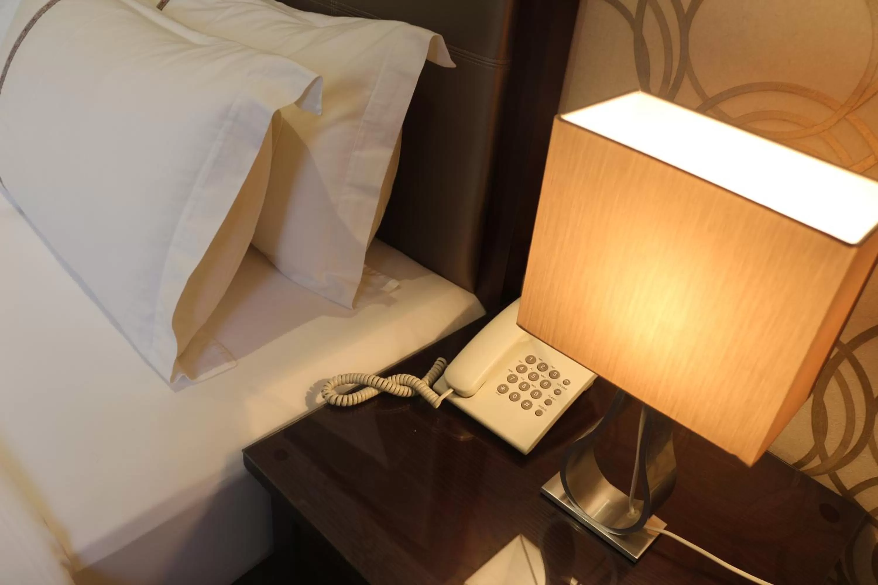 Bed in Nooryana Suites Boutique