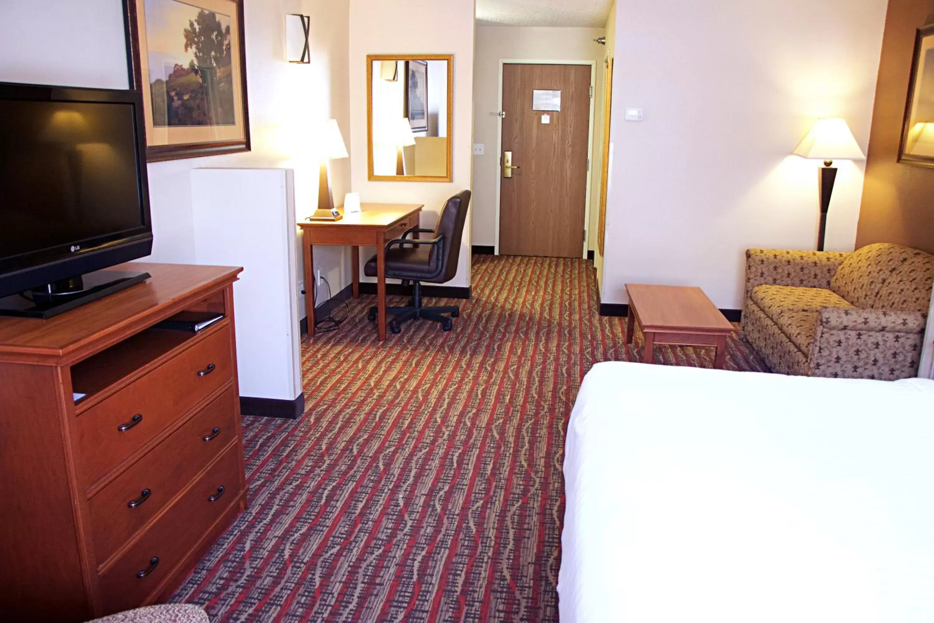 Photo of the whole room, TV/Entertainment Center in Holiday Inn Express Hotel & Suites Pierre-Fort Pierre, an IHG Hotel