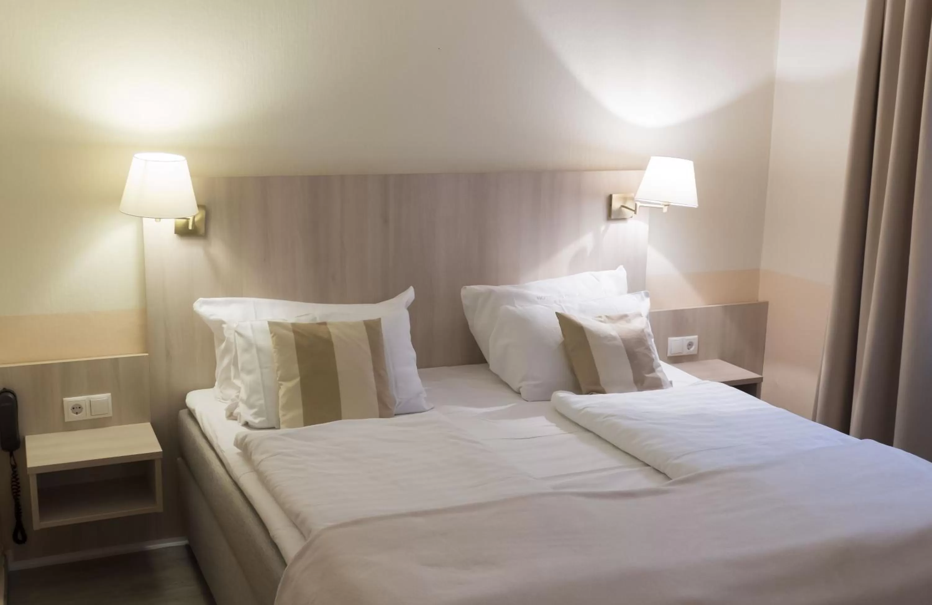 Bed in Hotel Excelsior