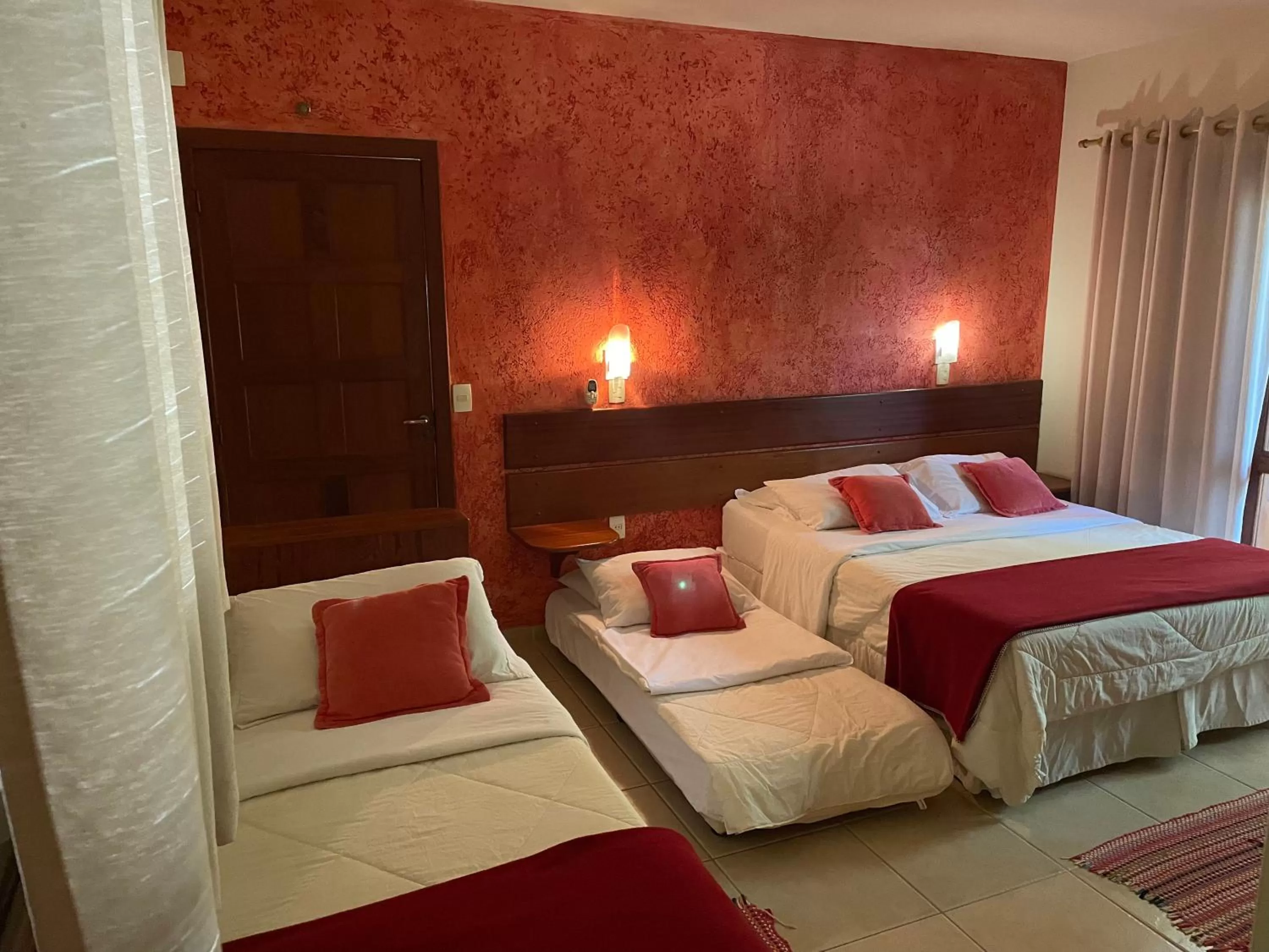 Bed in Pousada Ilha dos Anjos