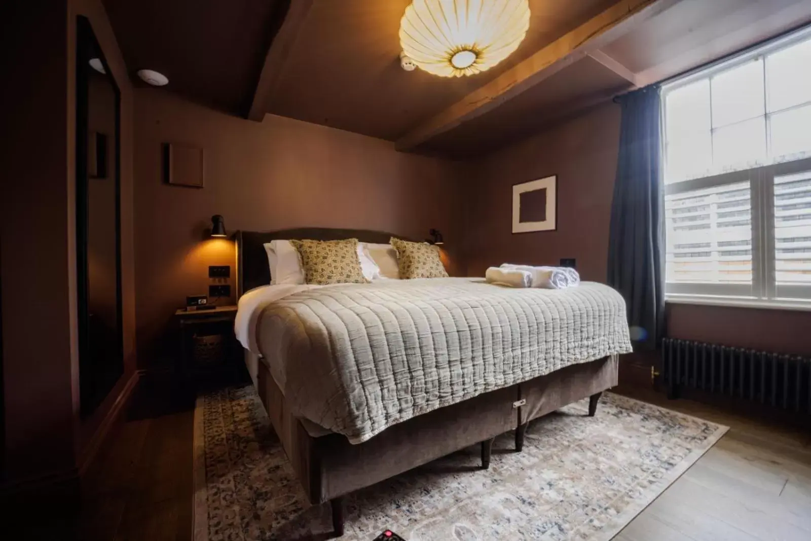 Bed in The Silk Rooms, at The Freemasons Inn