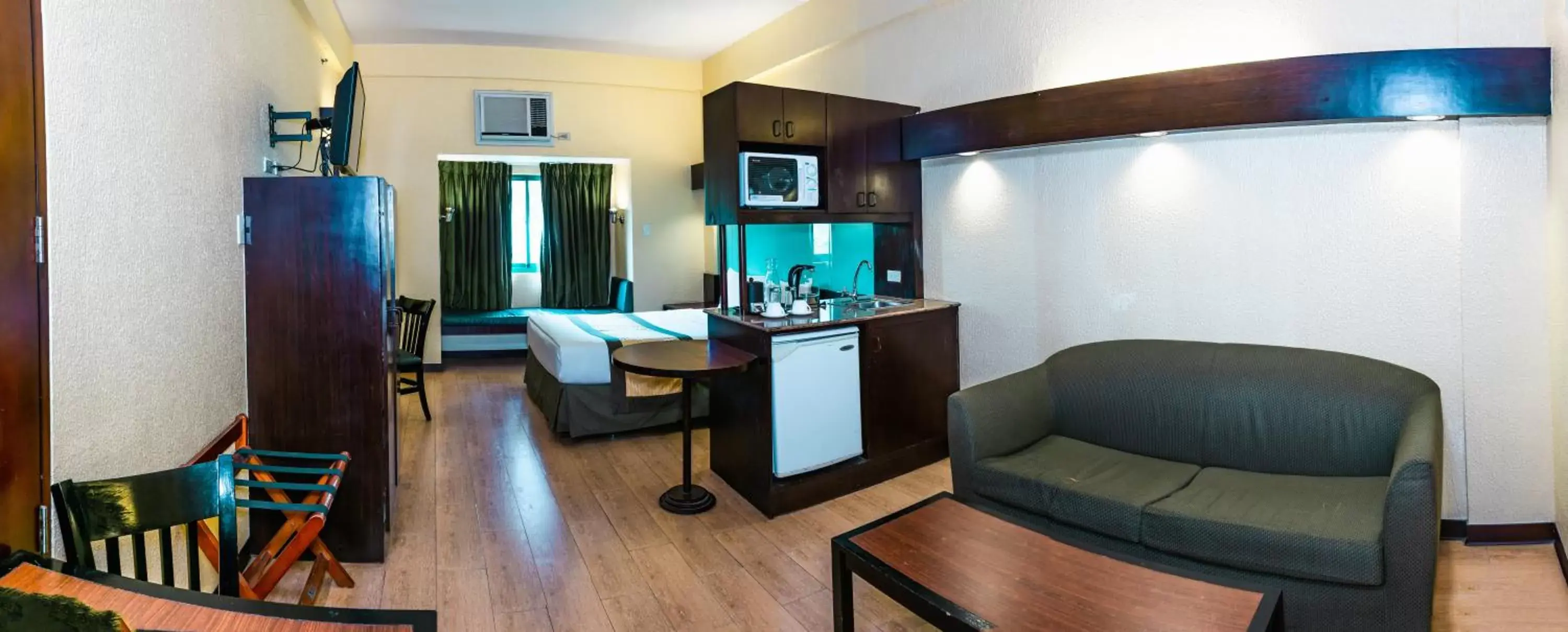 Bedroom, Seating Area in Microtel by Wyndham Cabanatuan