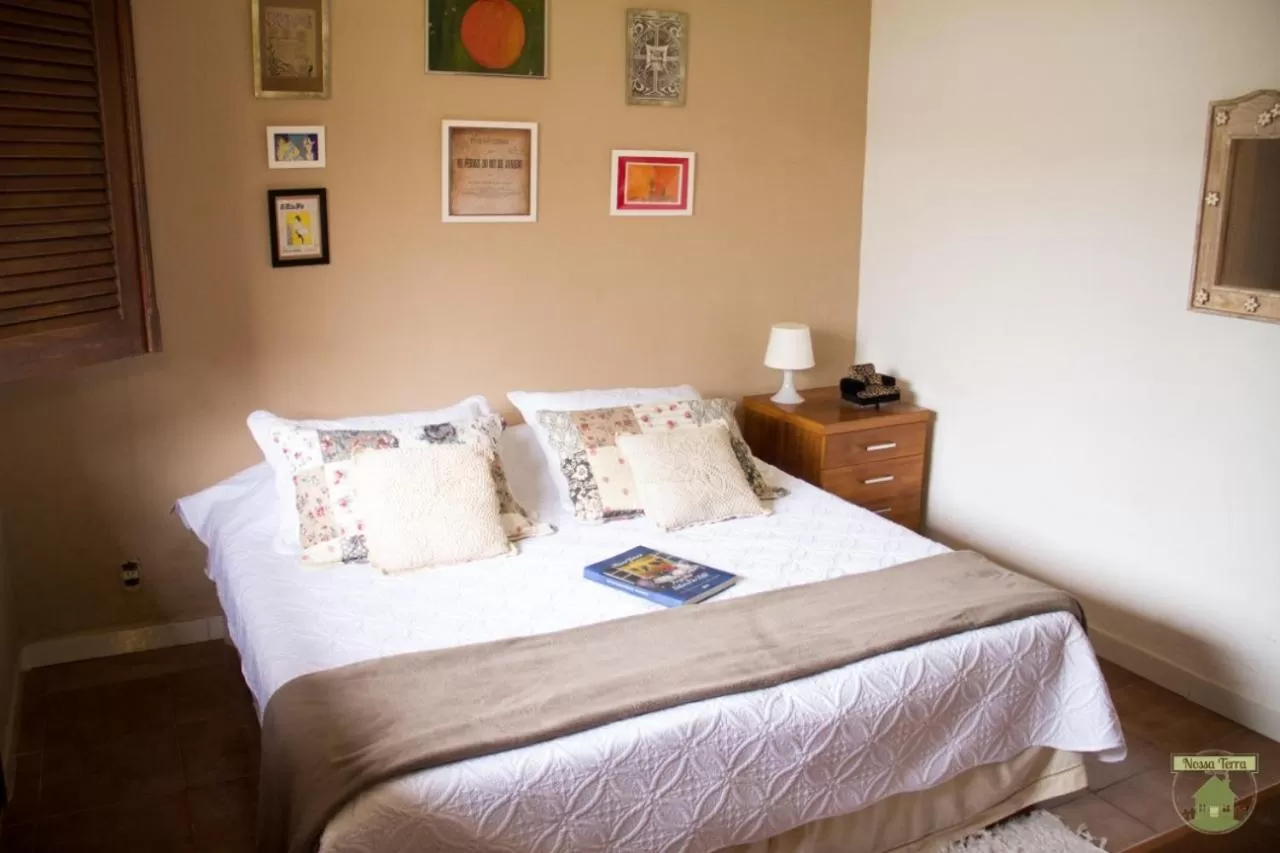 Bed in Pousada Nossa Terra
