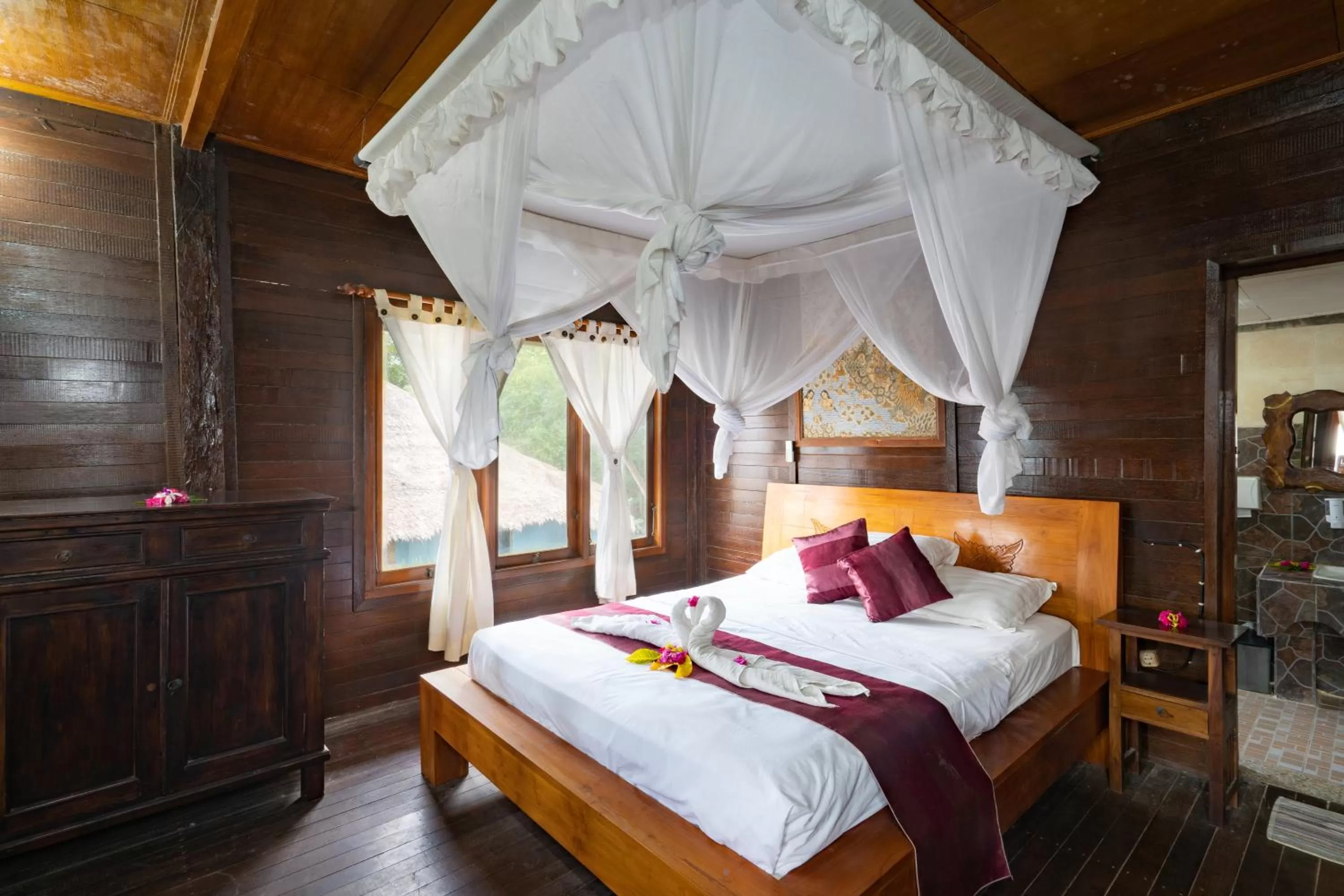 Bed in Mushroom Beach Bungalows