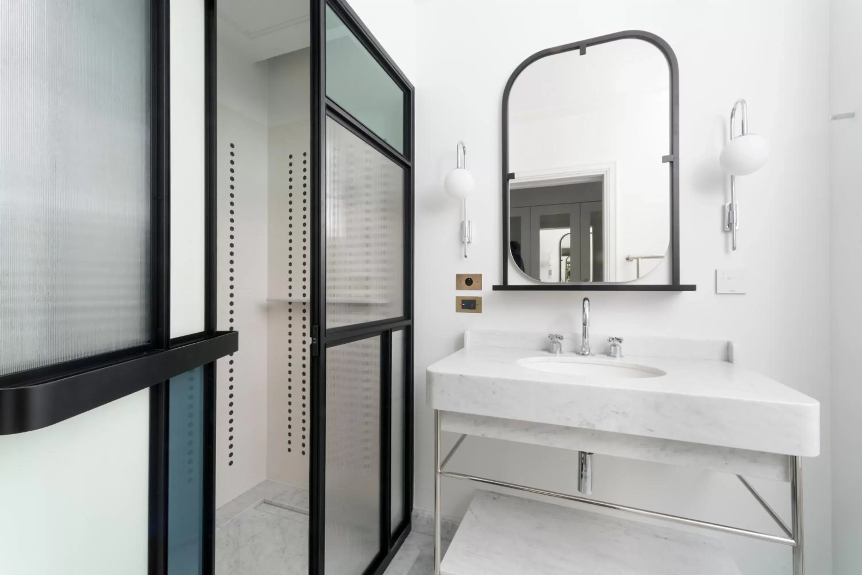 Bathroom in Kimpton - St Honoré Paris, an IHG Hotel