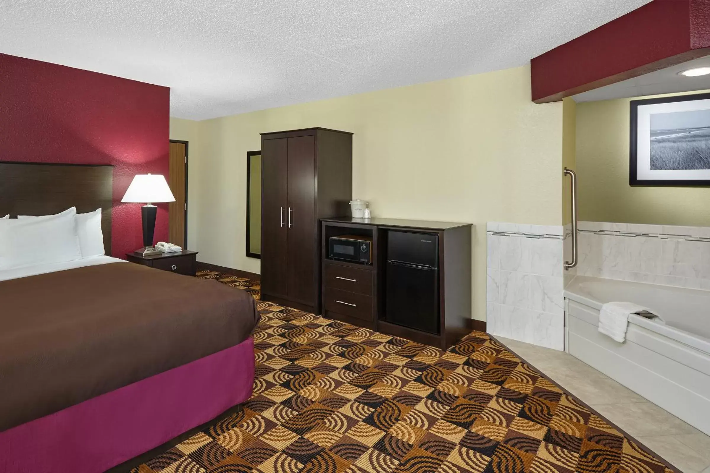 Photo of the whole room, Bed in AmericInn by Wyndham Elkhorn Near Lake Geneva