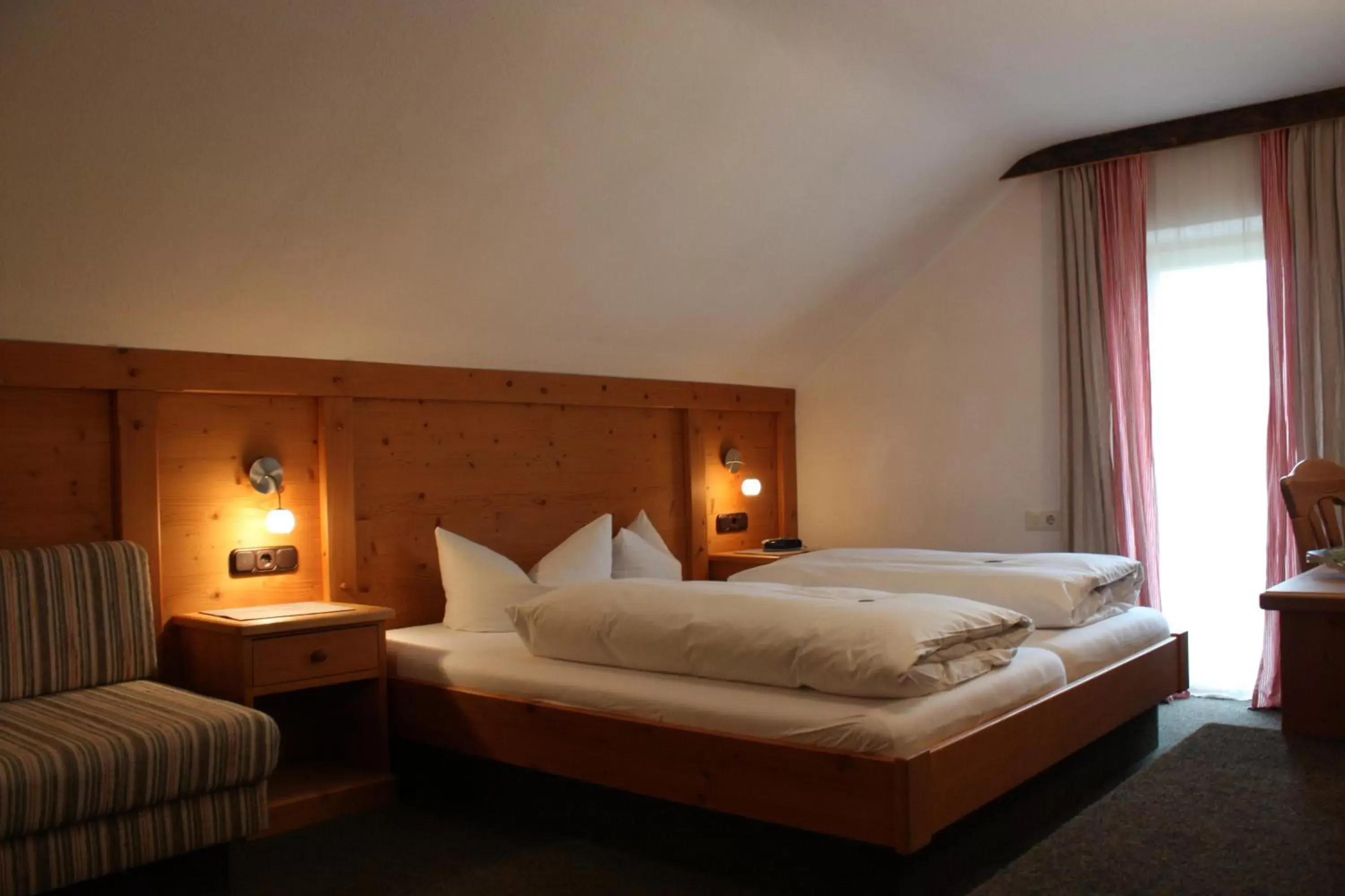 Bed in Das Posch Hotel