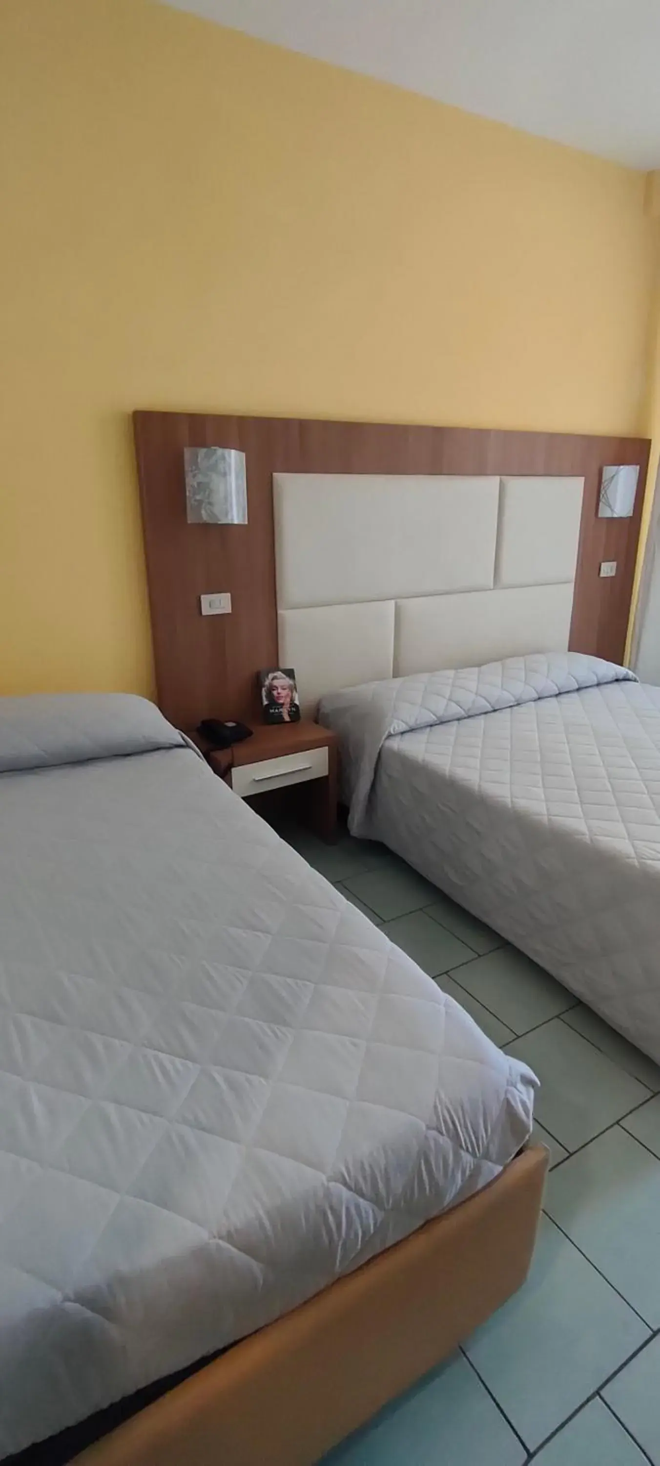 Photo of the whole room, Bed in Aura Living Hotel