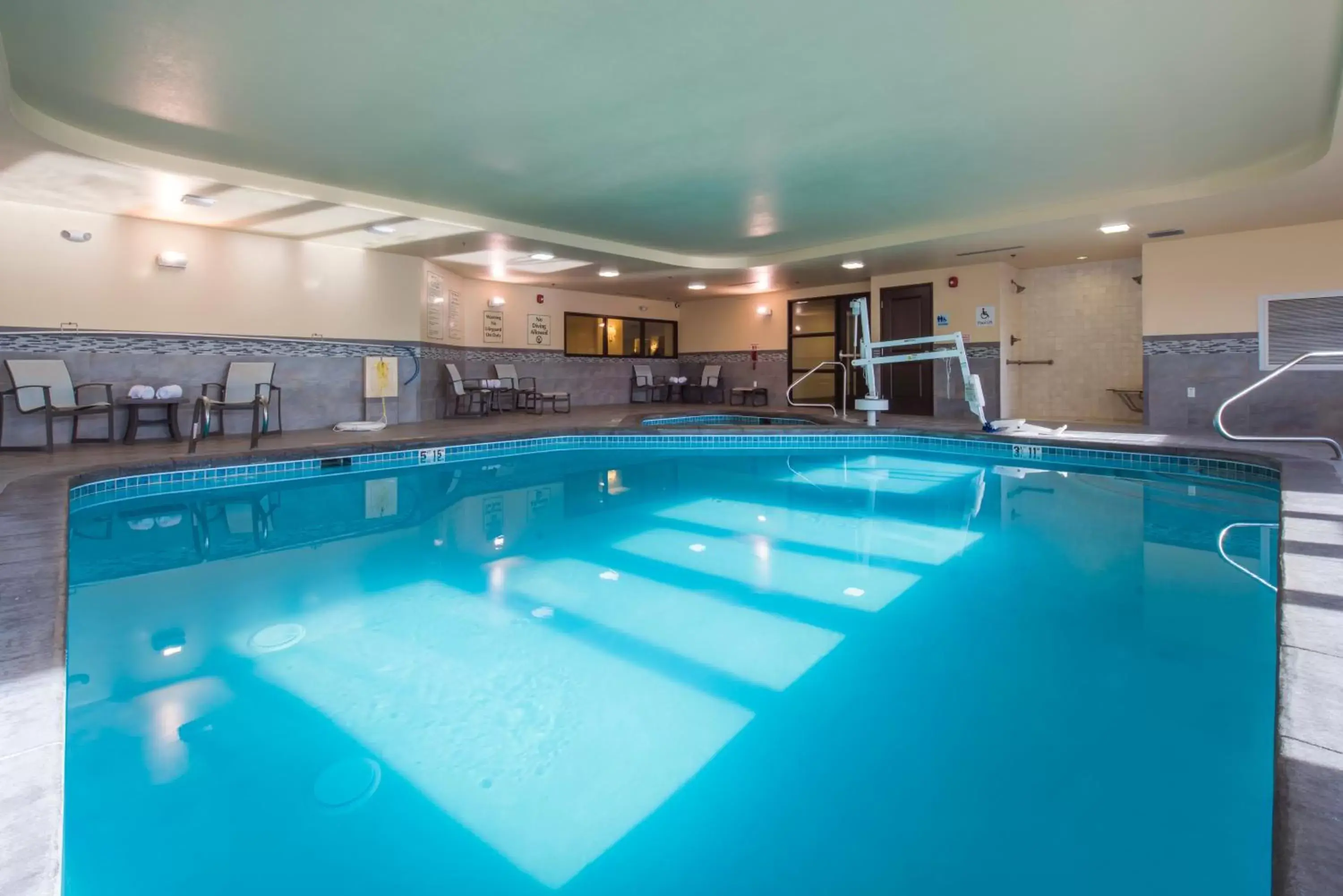 Swimming Pool in Holiday Inn Express & Suites Colorado Springs Central, an IHG Hotel