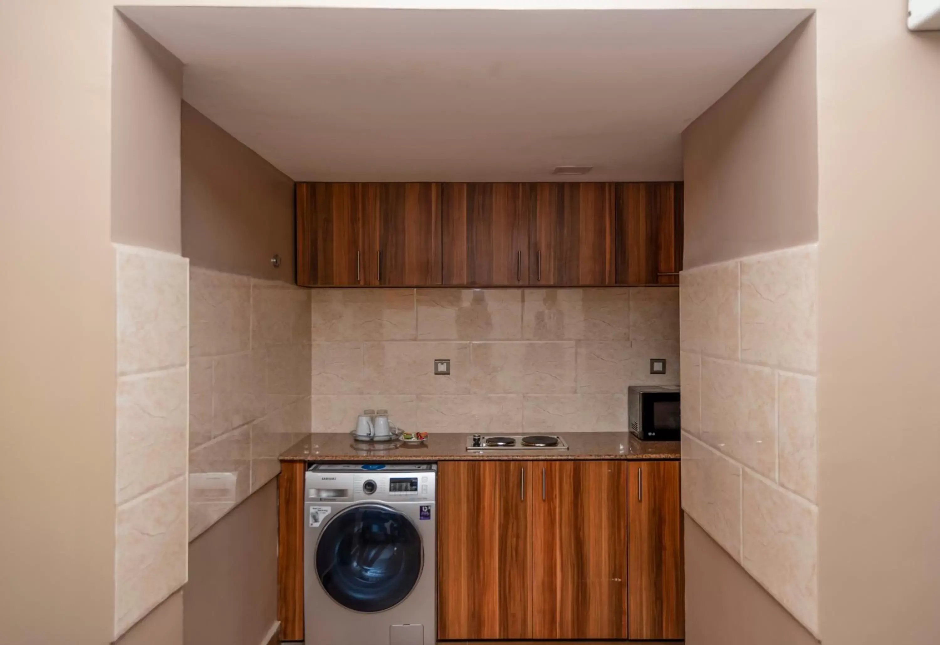 Kitchen or kitchenette, Kitchen/Kitchenette in Hawthorn Suites by Wyndham Abuja