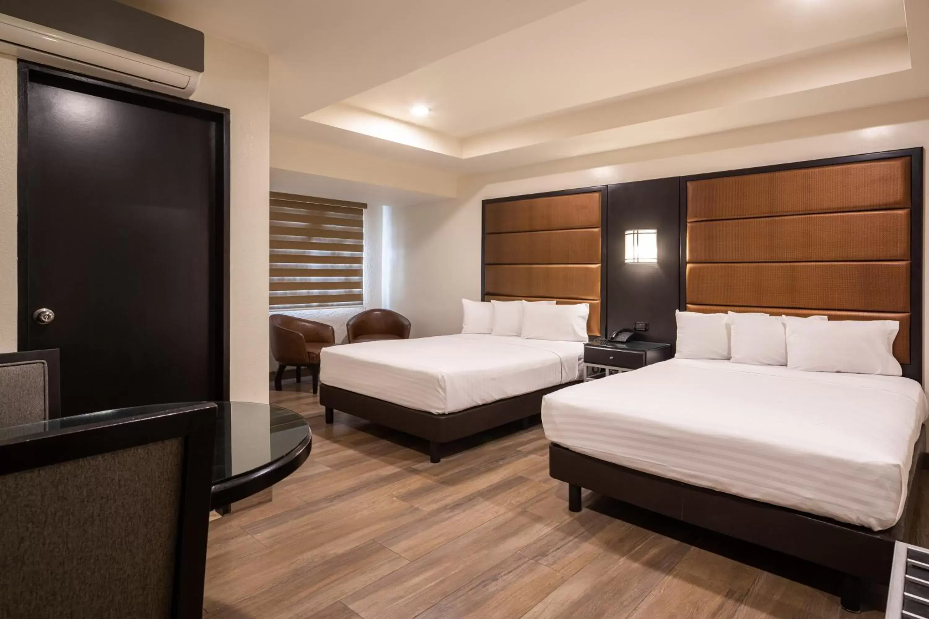 Bed in Hotel Astor Tijuana